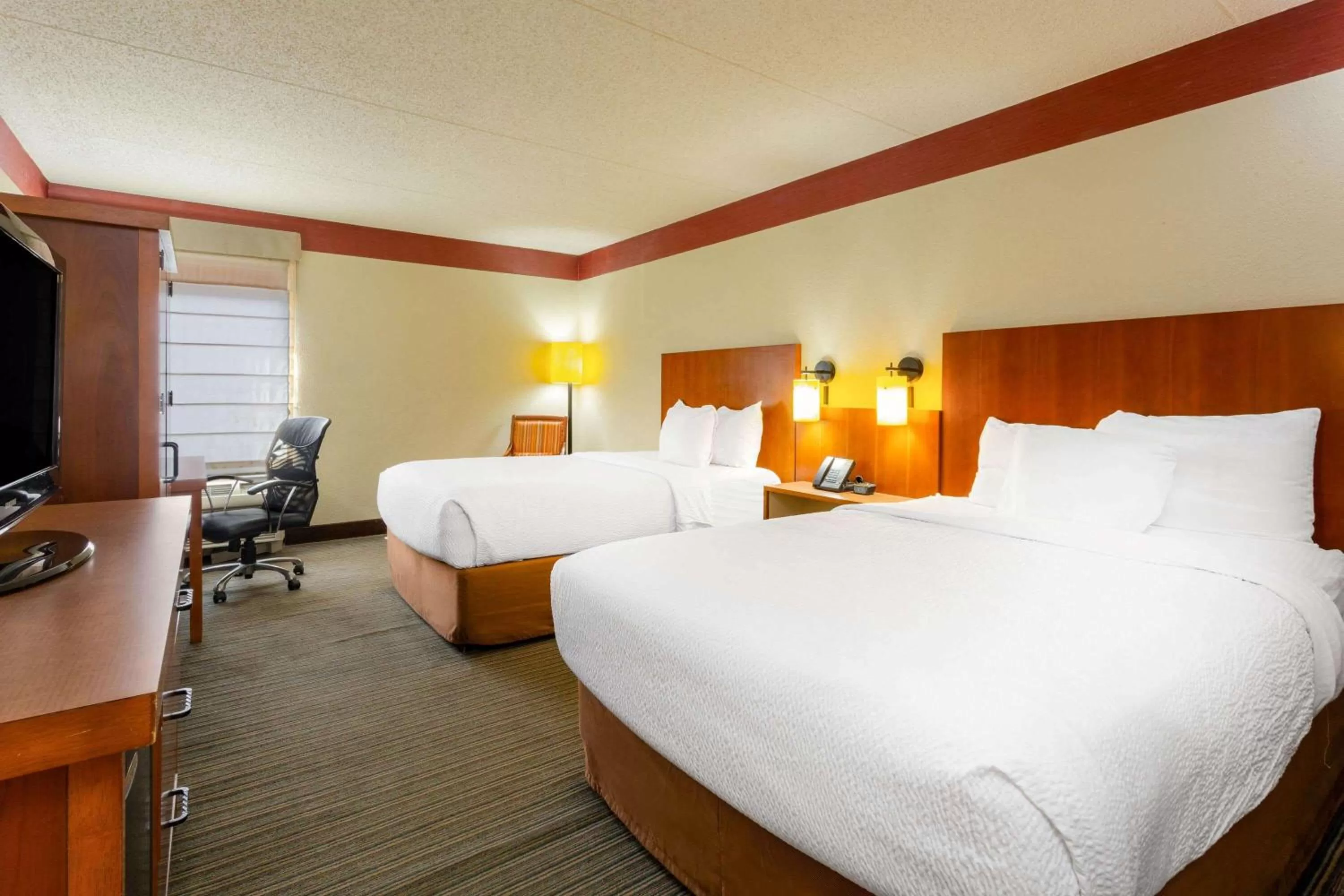 Photo of the whole room, Bed in CLT Airport Inn & Suites