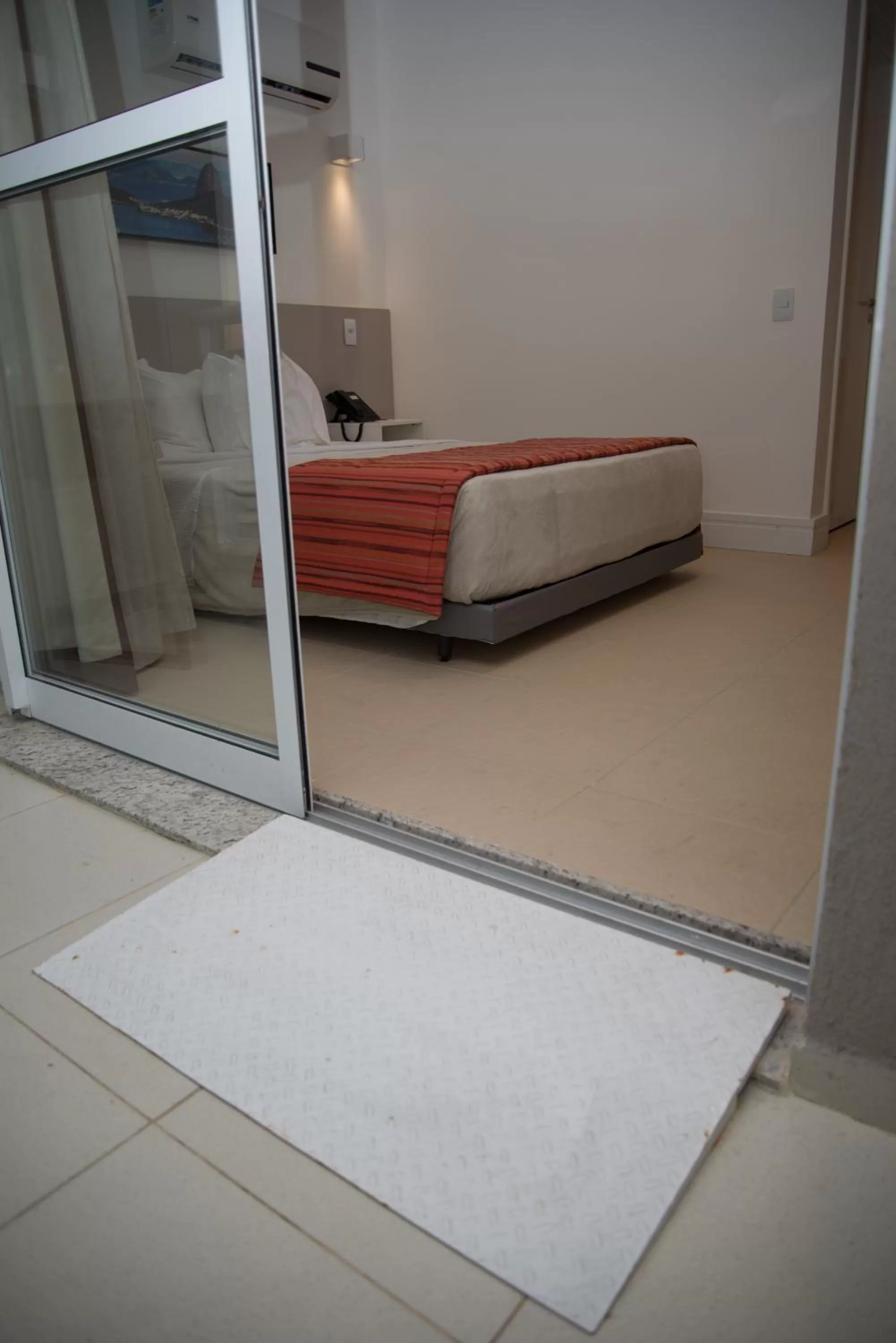Bed in Ramada by Wyndham Macae Hotel & Suites