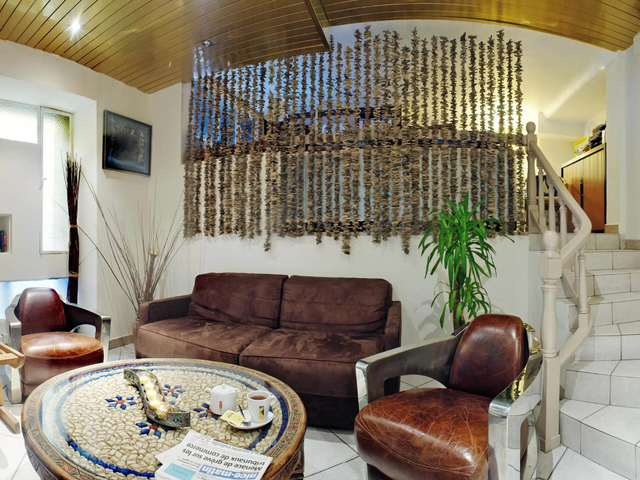 Communal lounge/ TV room in Hôtel Esprit d'Azur