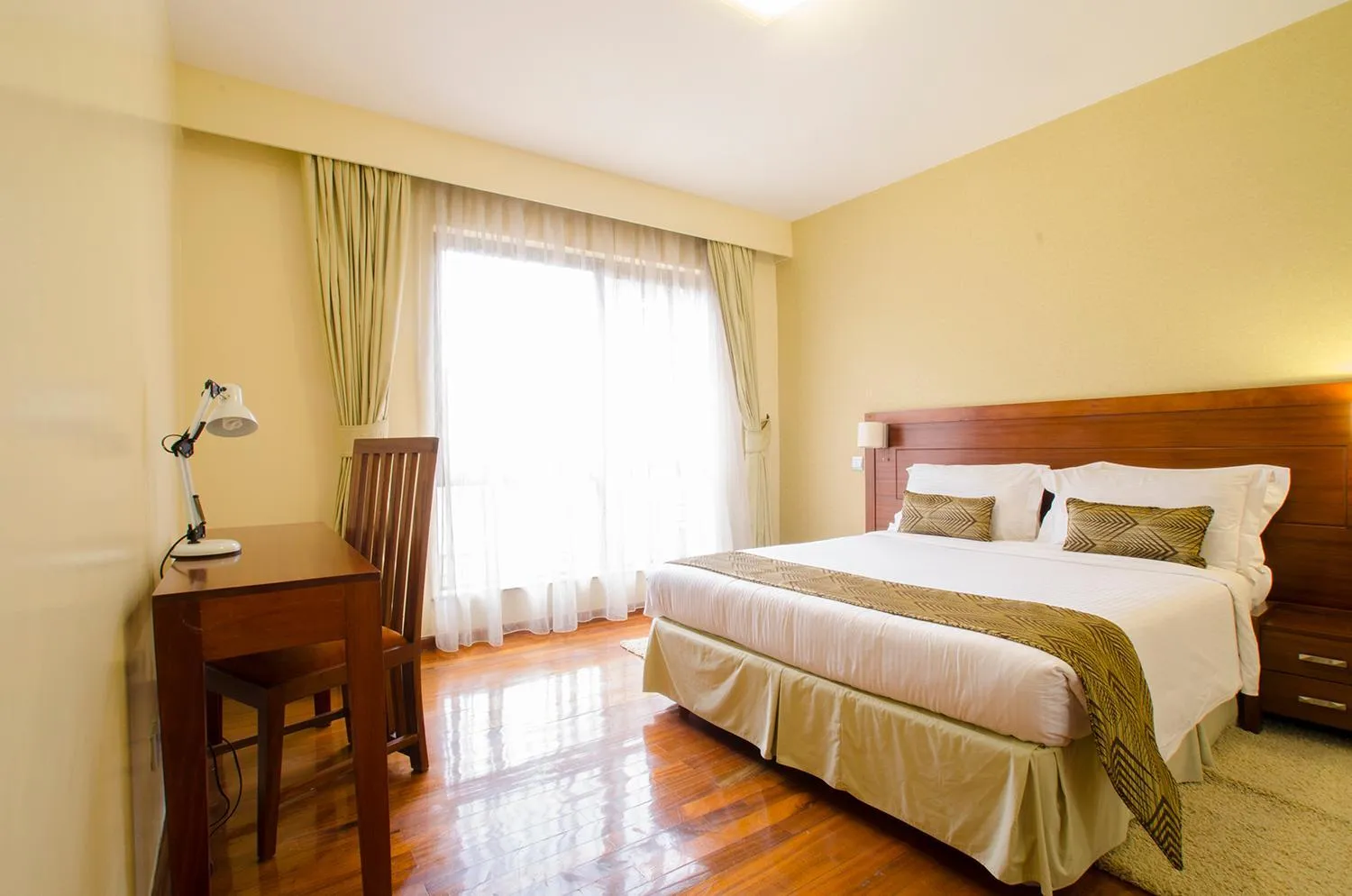 Photo of the whole room, Bed in Waridi Paradise Hotel and Suites