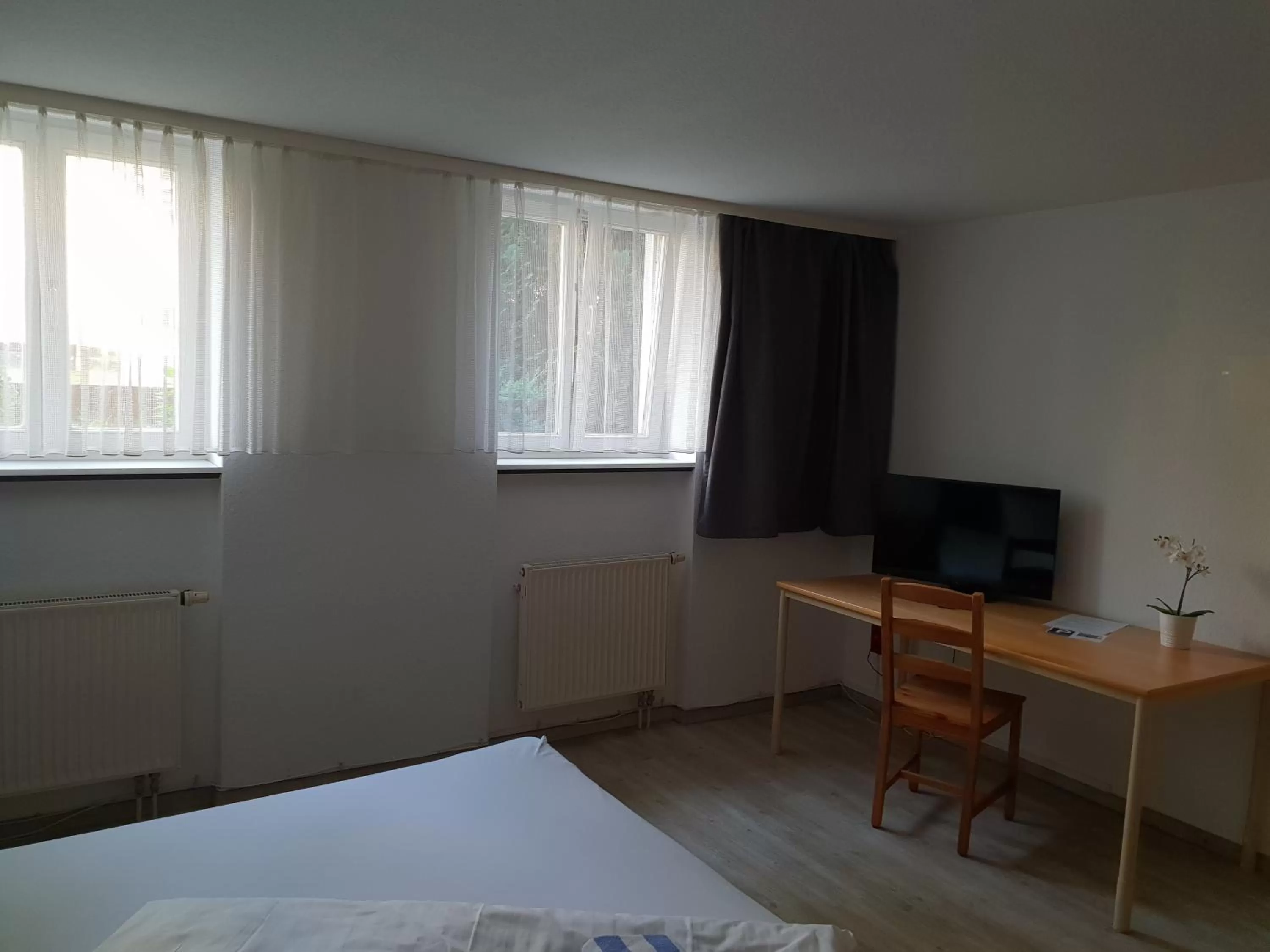 Bed in Appartement-Hotel Rostock