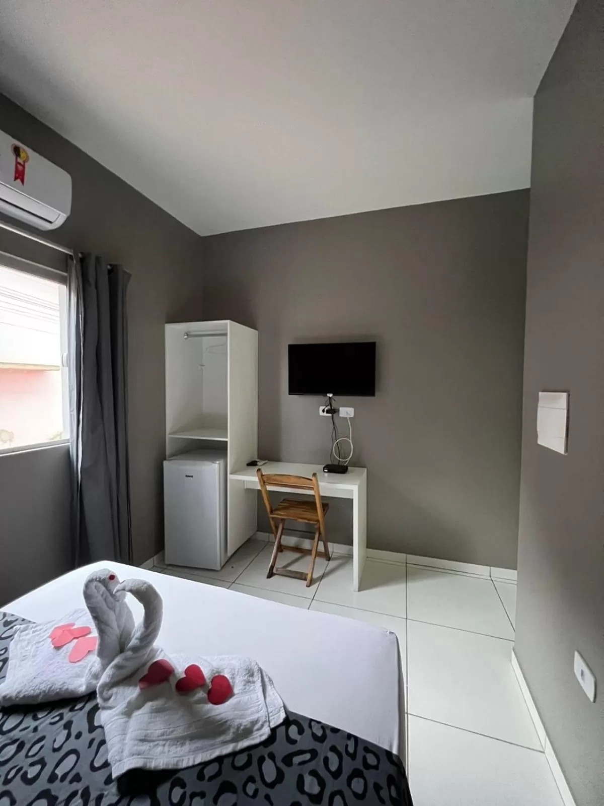 TV/Entertainment Center in Pousada Praia Bela