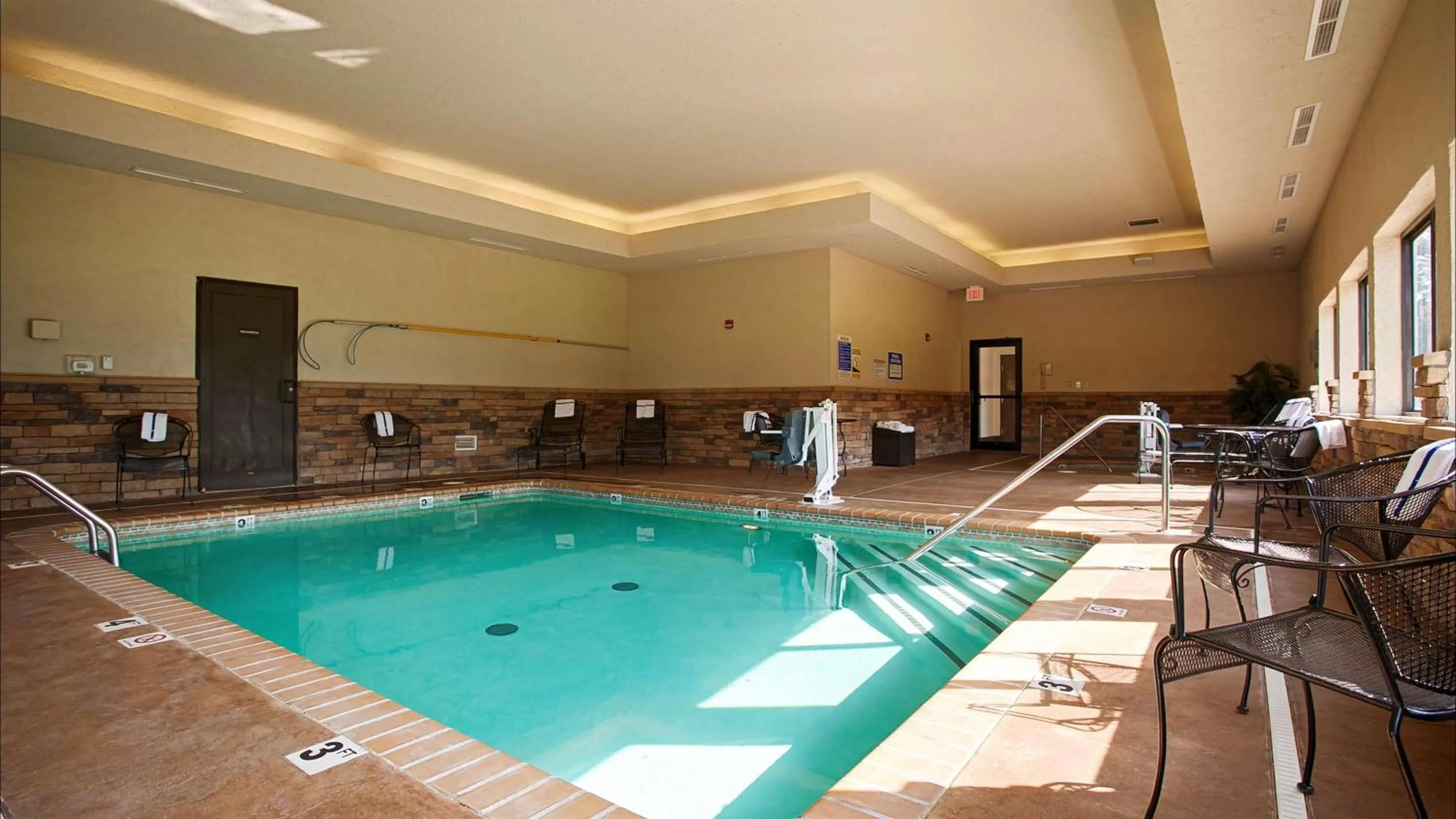 Swimming pool in SureStay Plus Hotel by Best Western Coffeyville