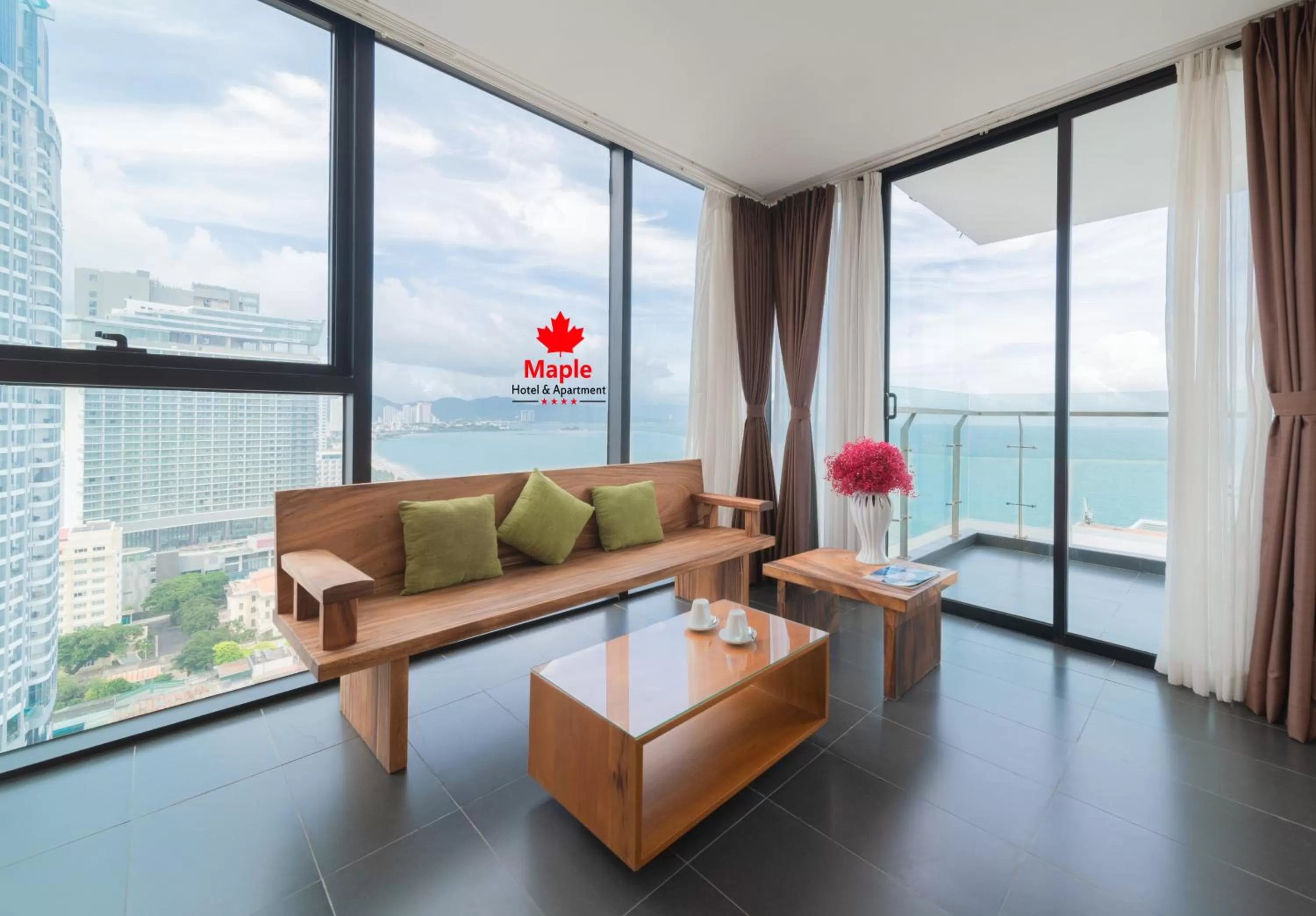 Living room in Maple Hotel & Apartment