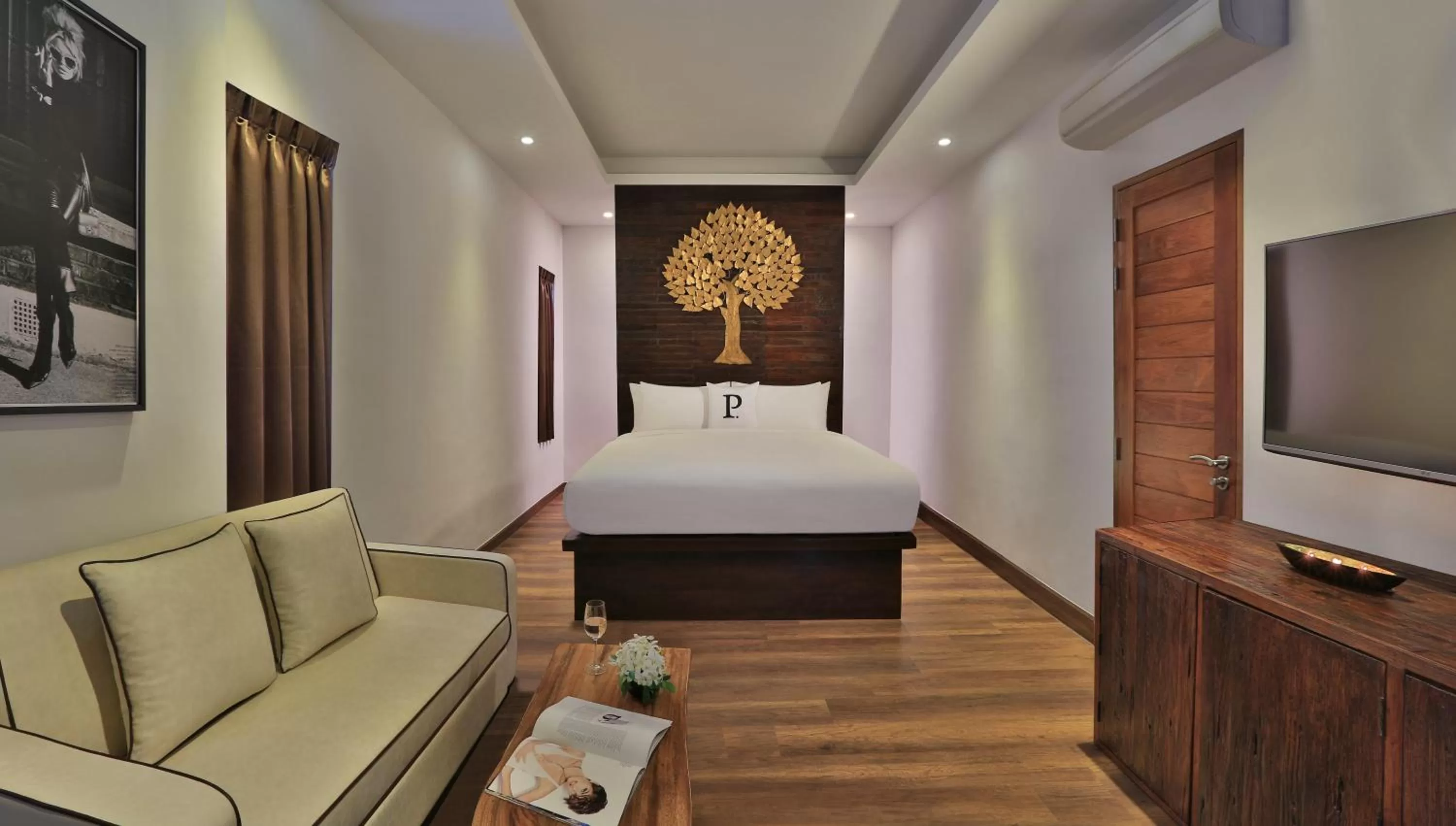 Bed in The Privilege Hotel Ezra Beach Club