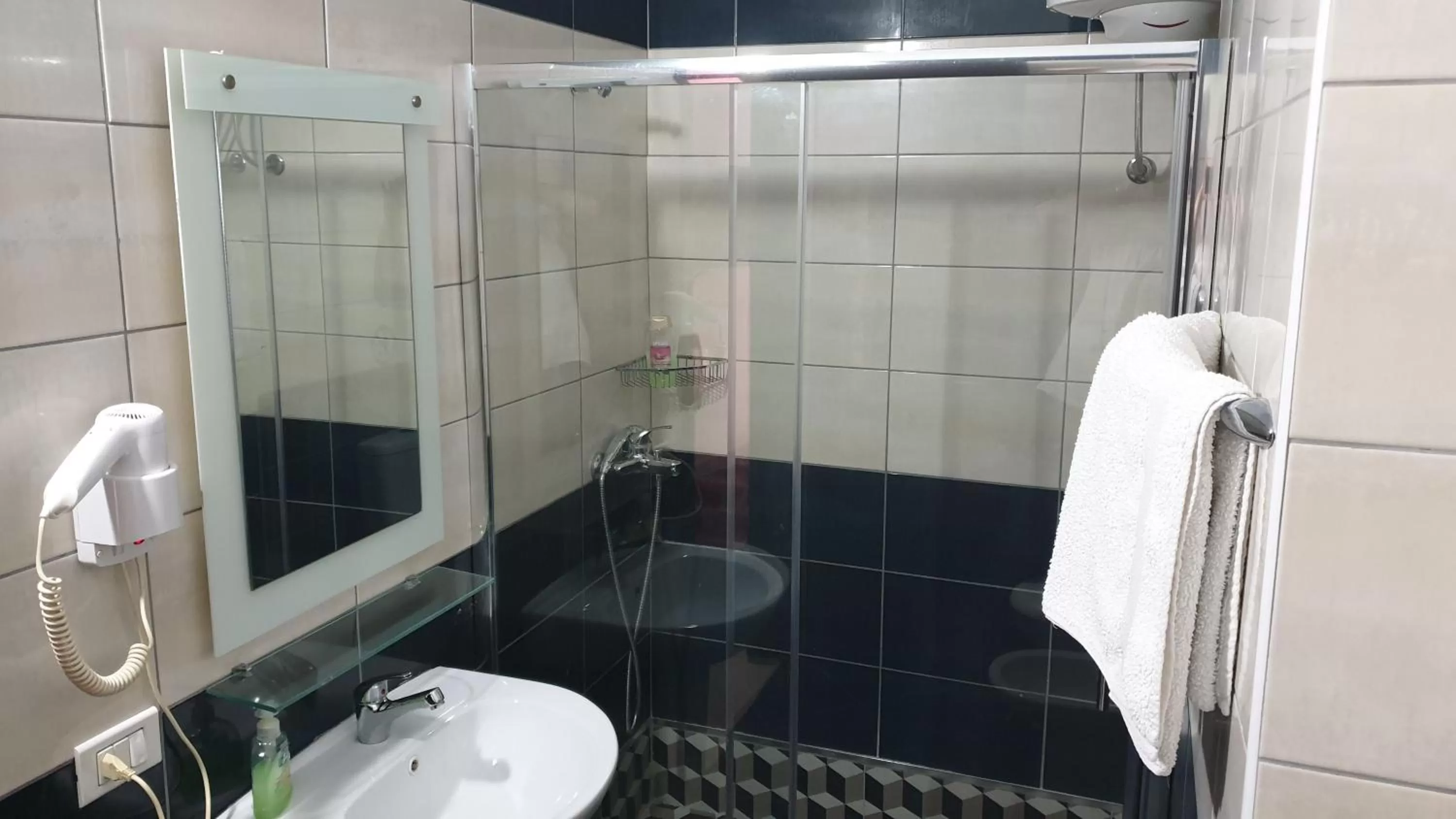 Bathroom in Haris Hotel