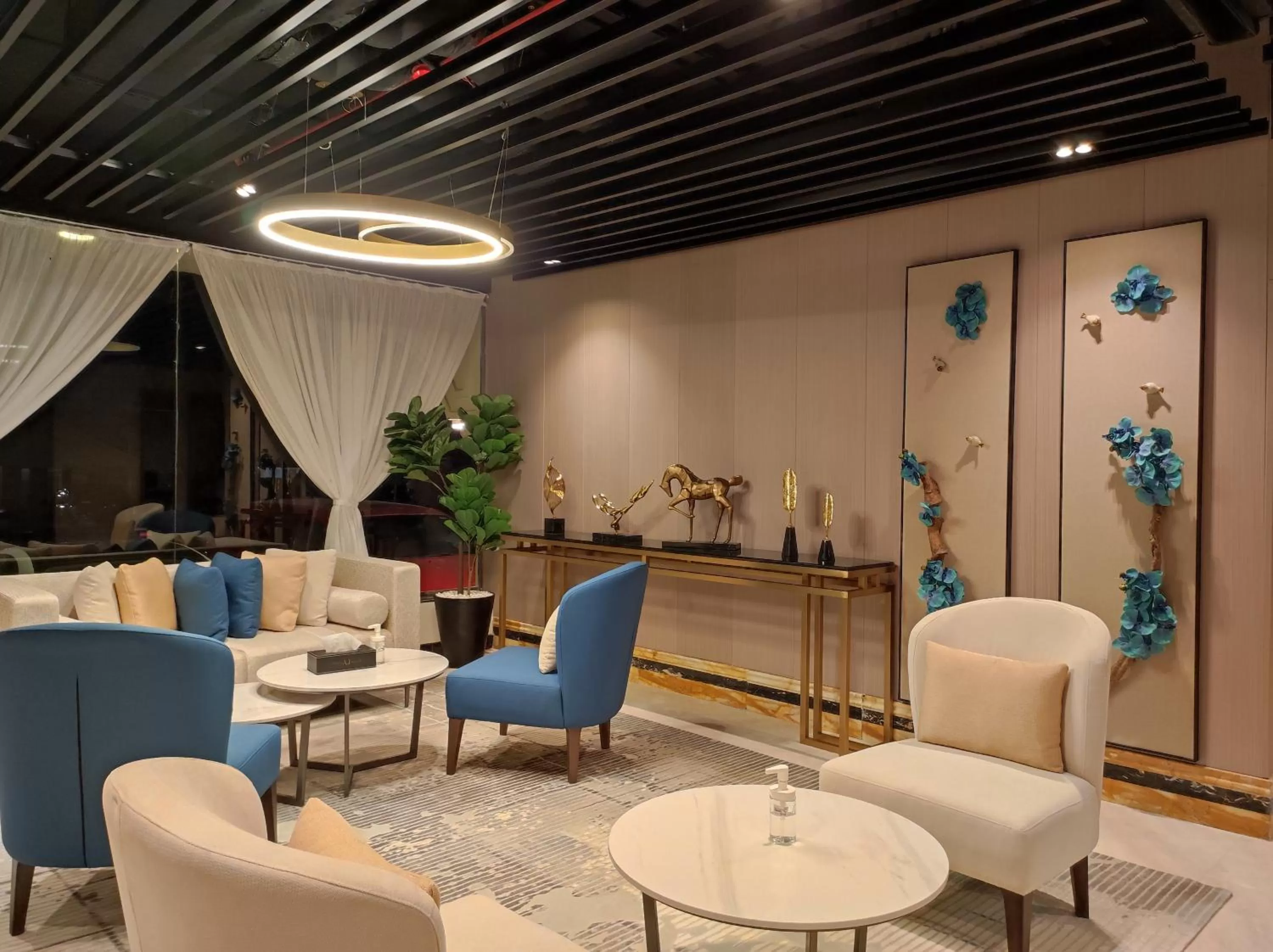 Lobby or reception in Aquila Al Hamra Hotel