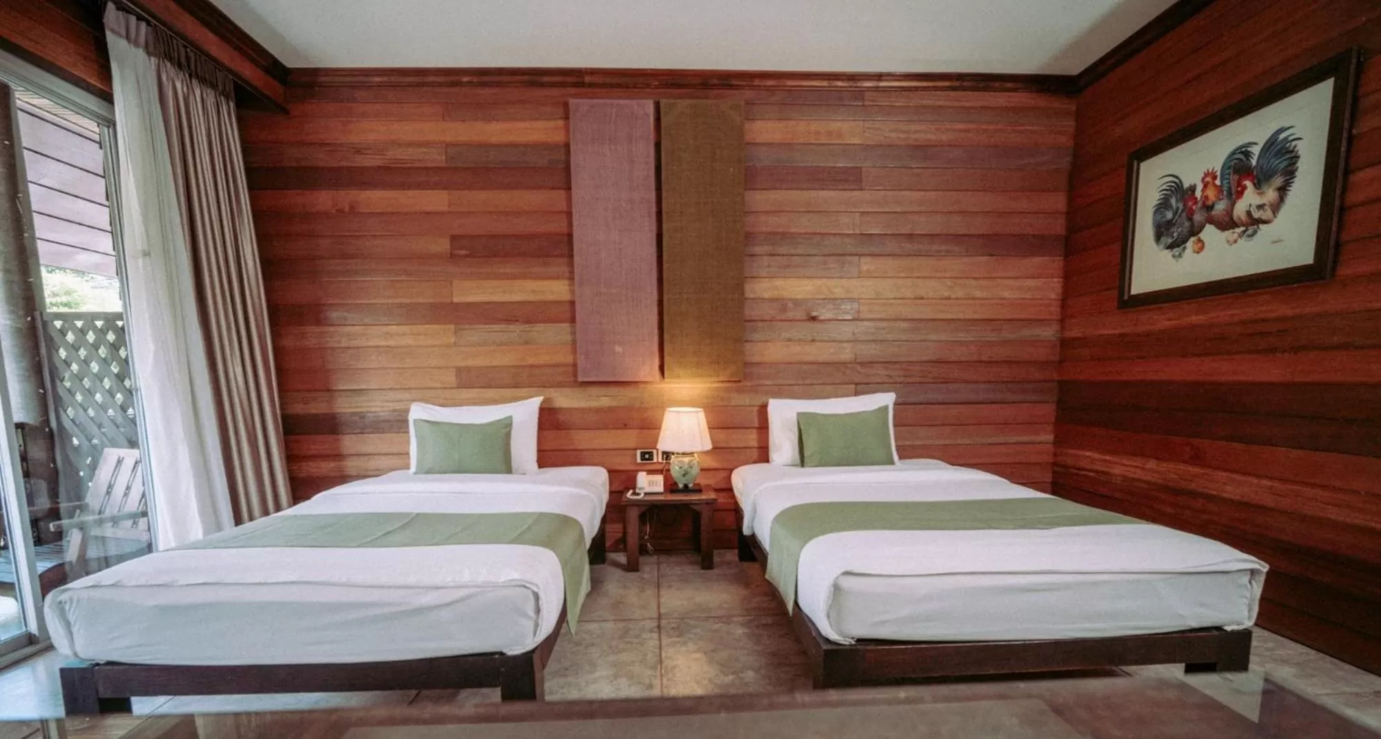 Bed in Royal River Kwai Resort and Spa
