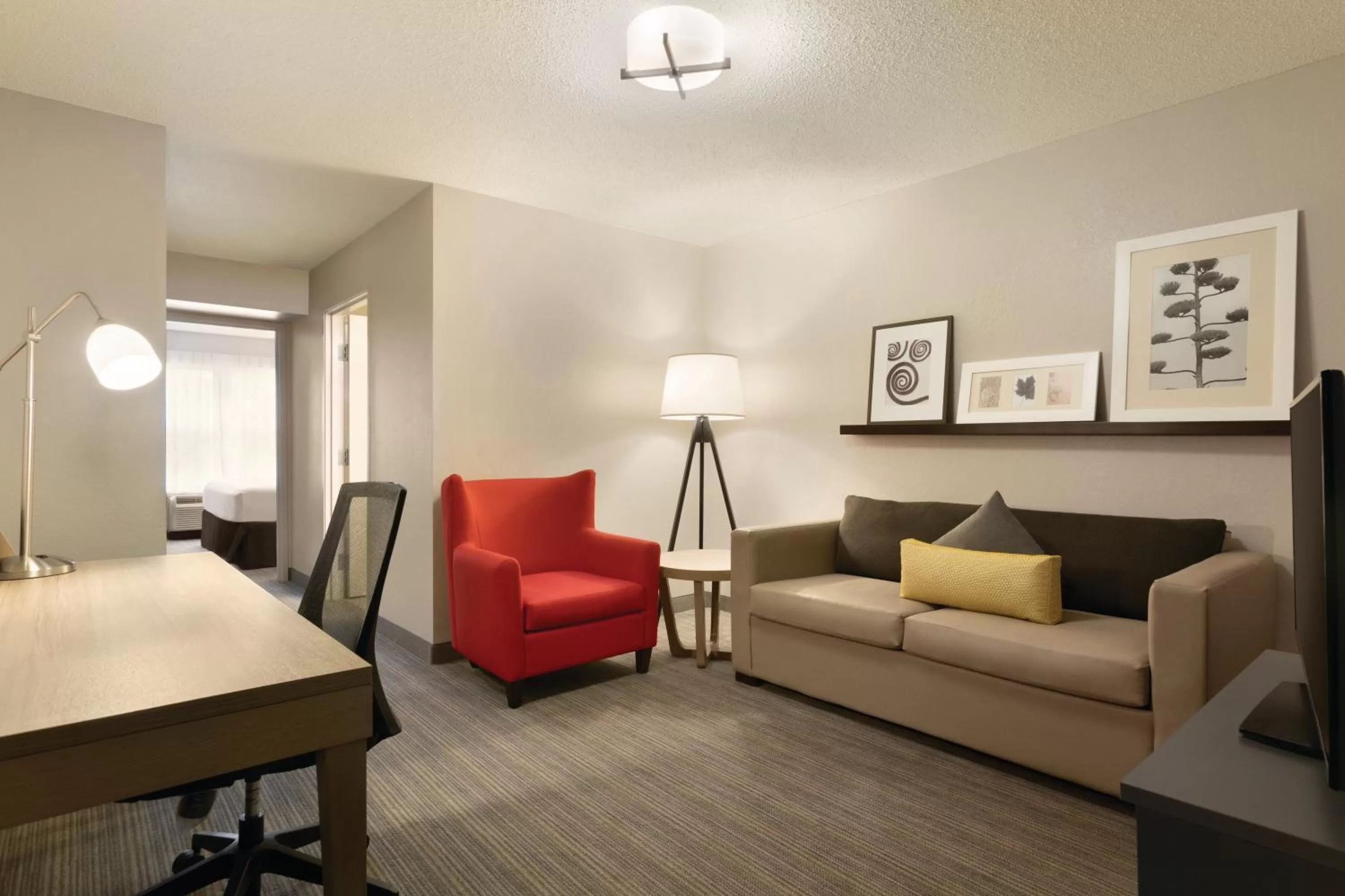 Seating area in Country Inn & Suites by Radisson, Brooklyn Park - Brooklyn Center, MN