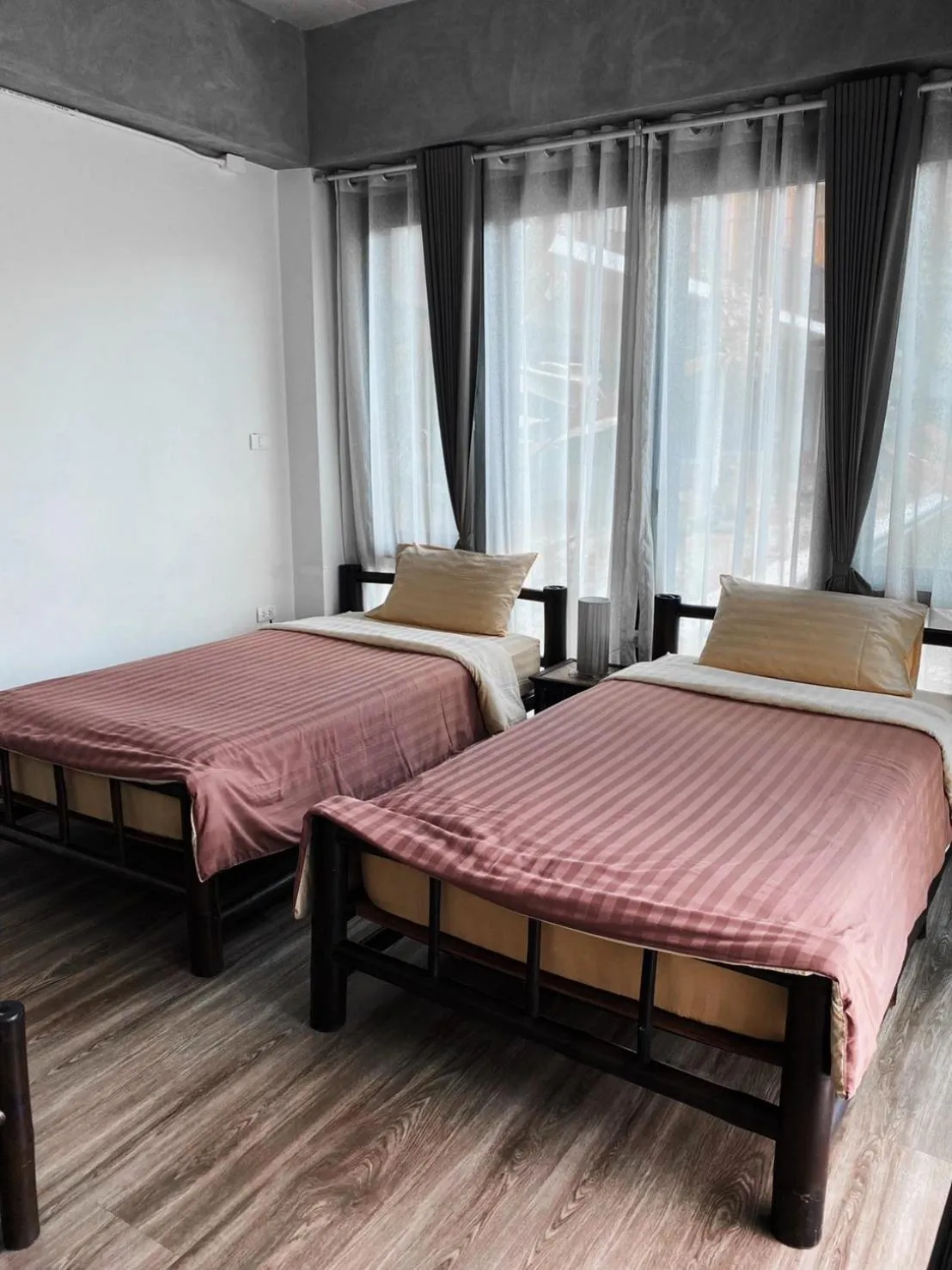 Bed in Lamphu House Chiang Mai