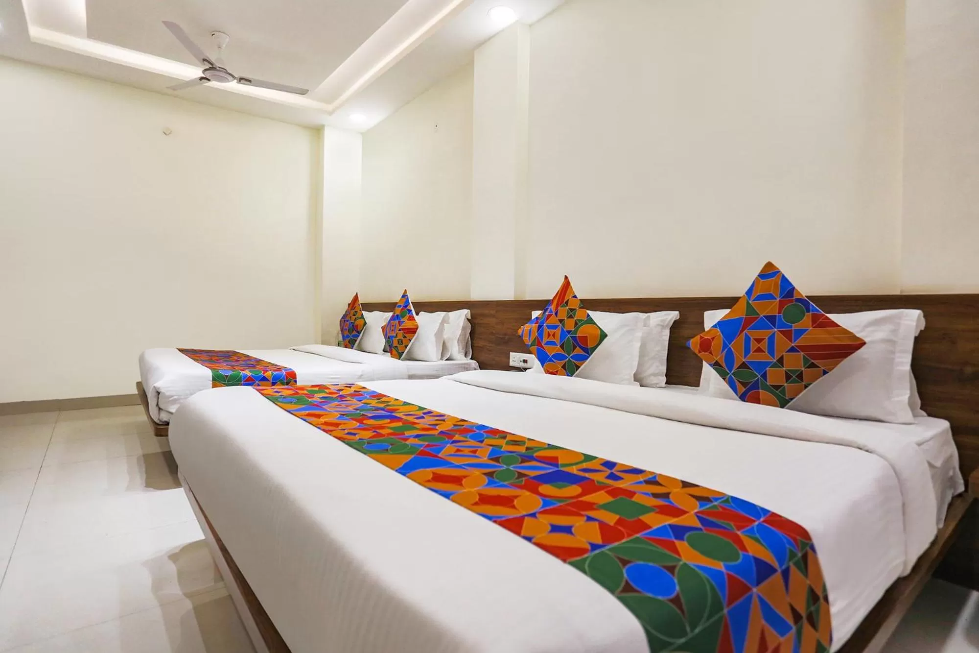 Bed in FabHotel Balaji Paradise