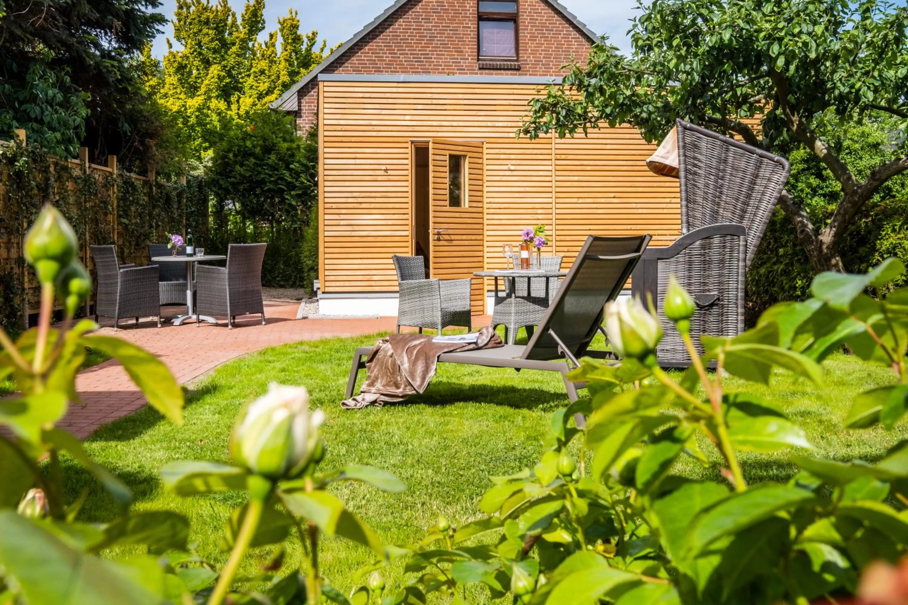 Sauna, Property Building in Hotel Apartments Büngers - Mein Refugium am Meer mit Sommerstrandkorb