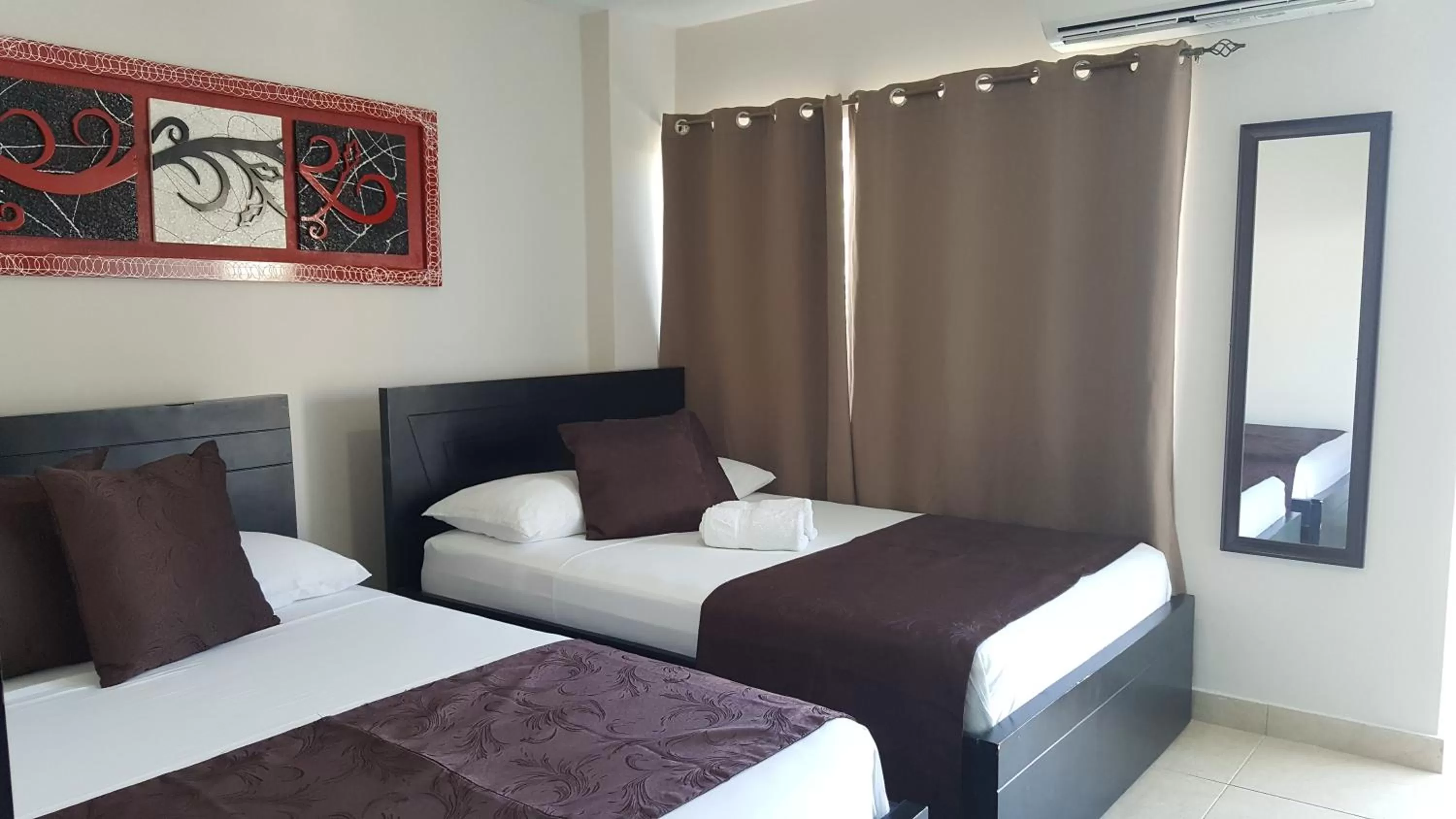 Bed in Caribbean Island Hotel Piso 2