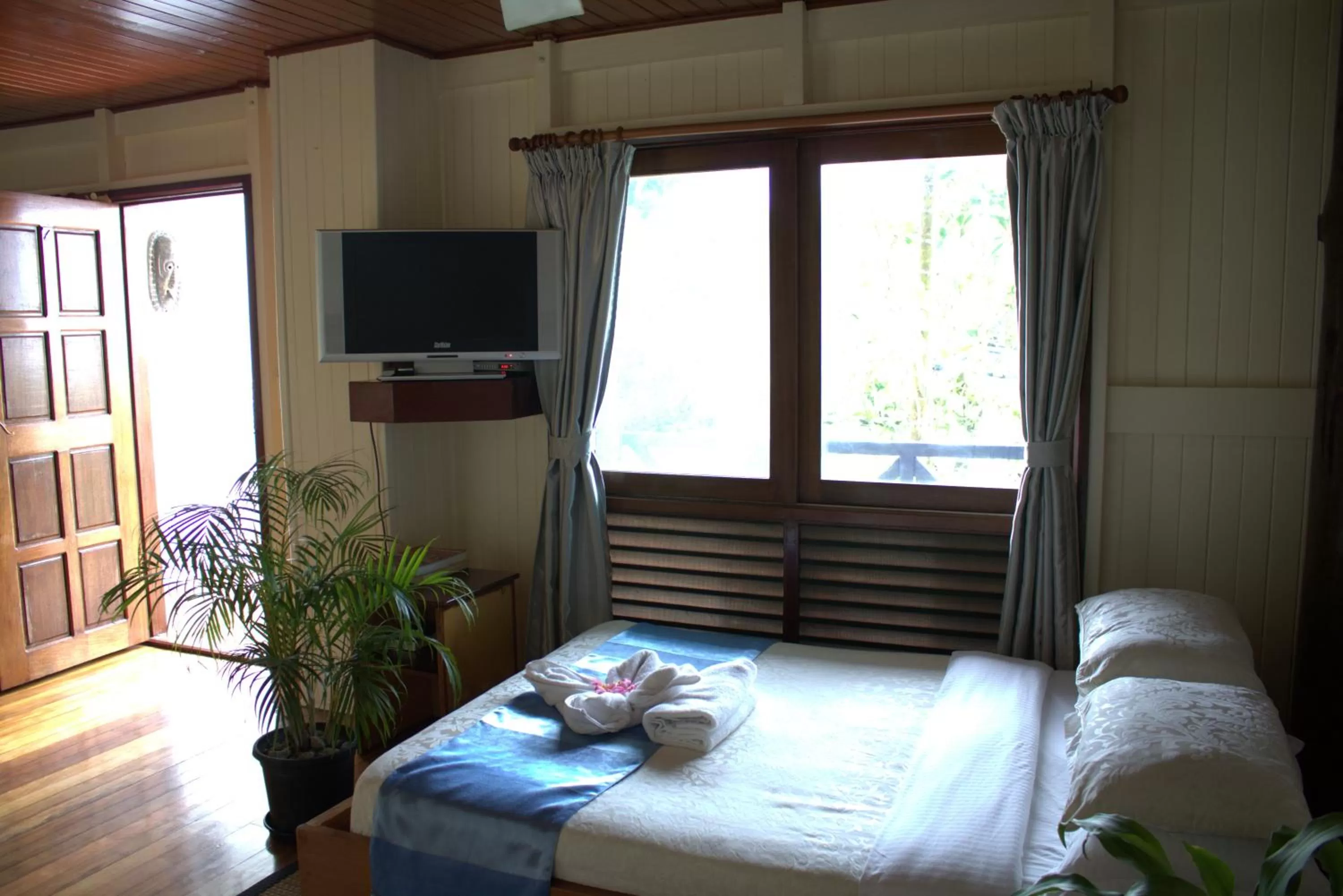 Bed in Rapopo Plantation Resort