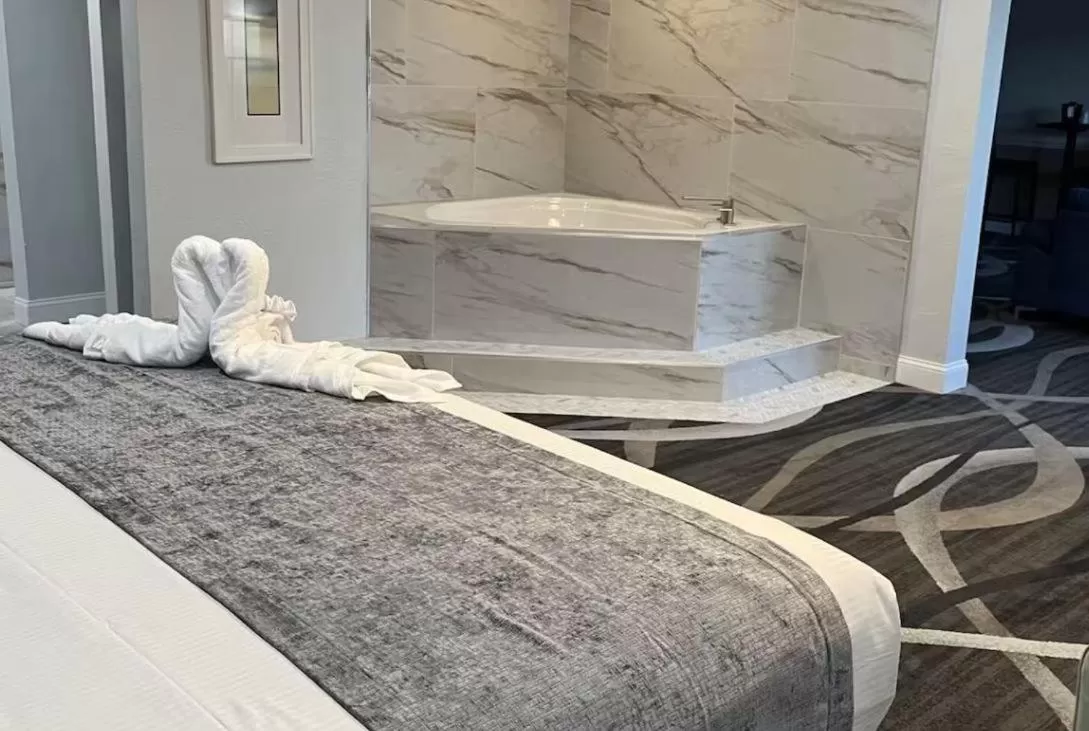 Bed in Opal Hotel & Suites