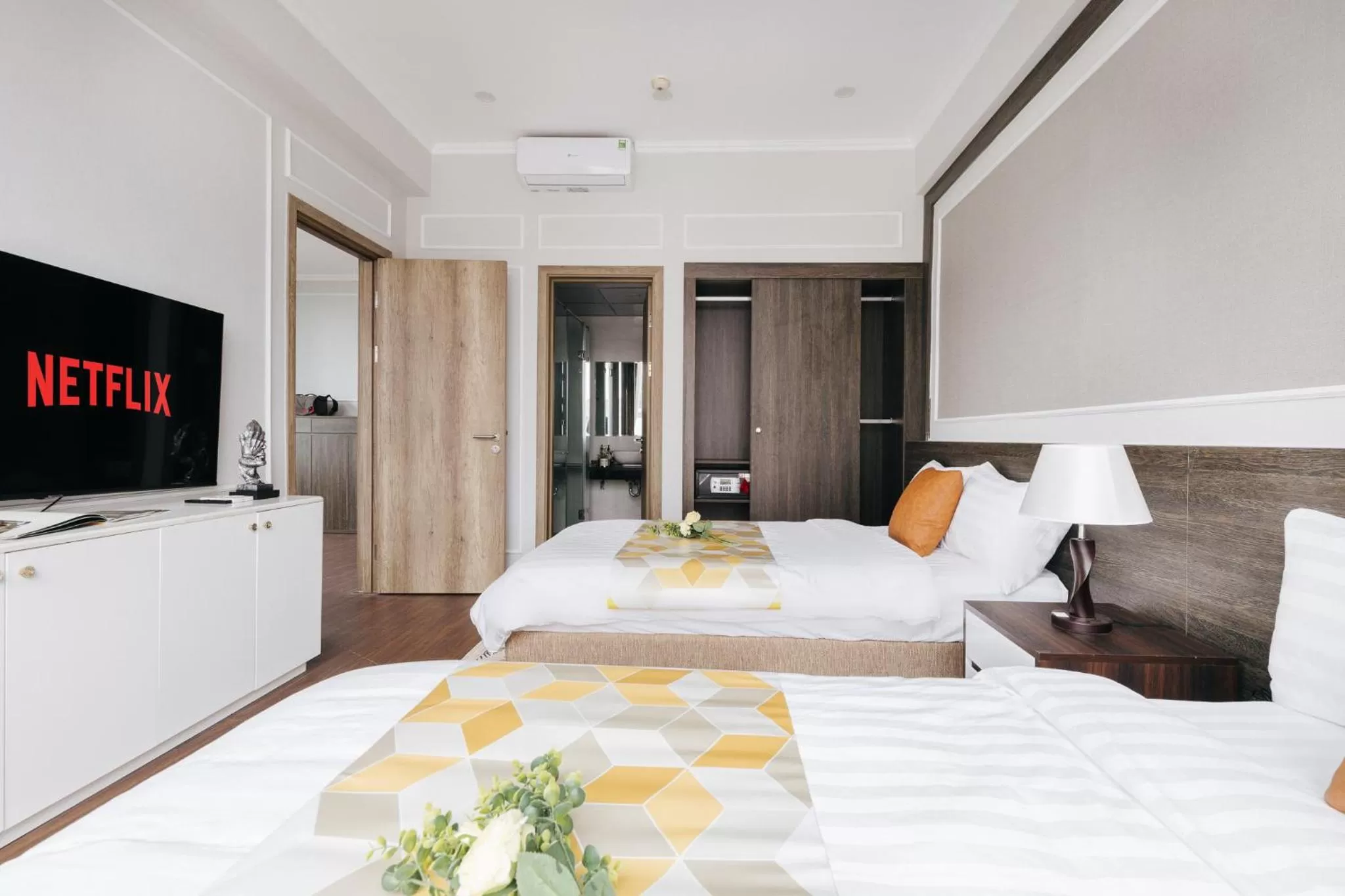 Bed in Ivy Hotel & Apartment