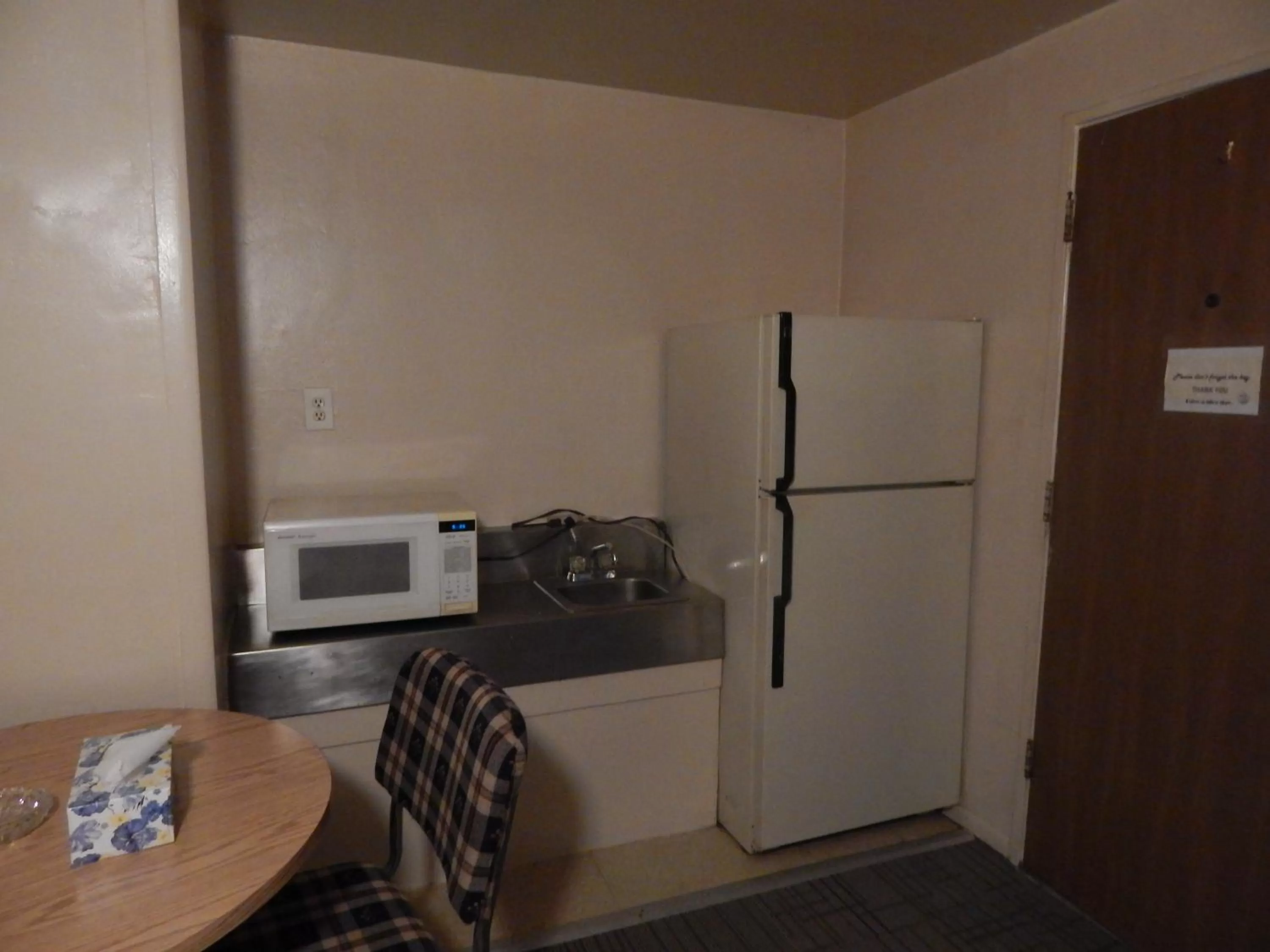 Kitchen or kitchenette in Ute Motel