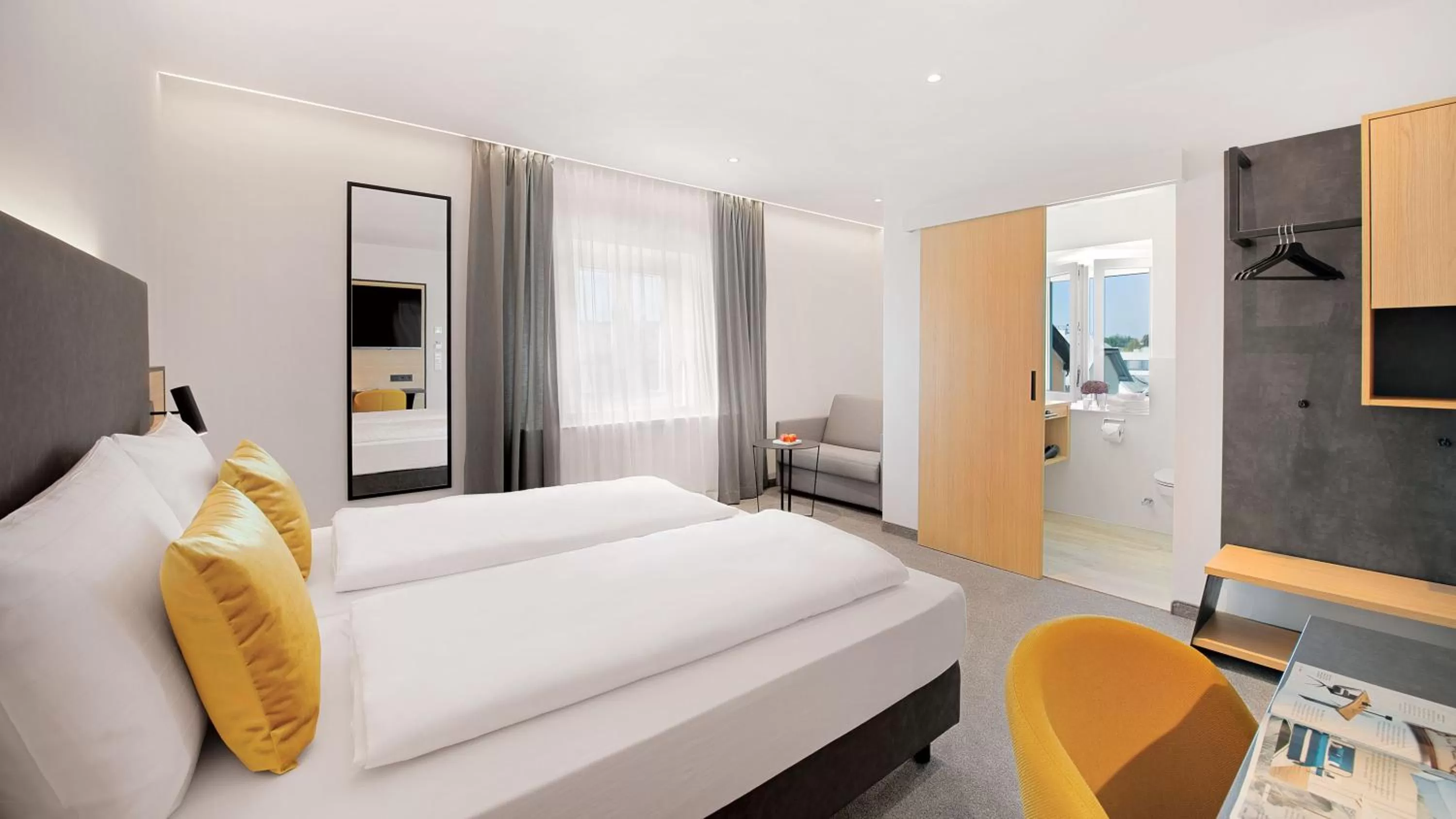 Photo of the whole room, Bed in Stadthotel Oberndorf