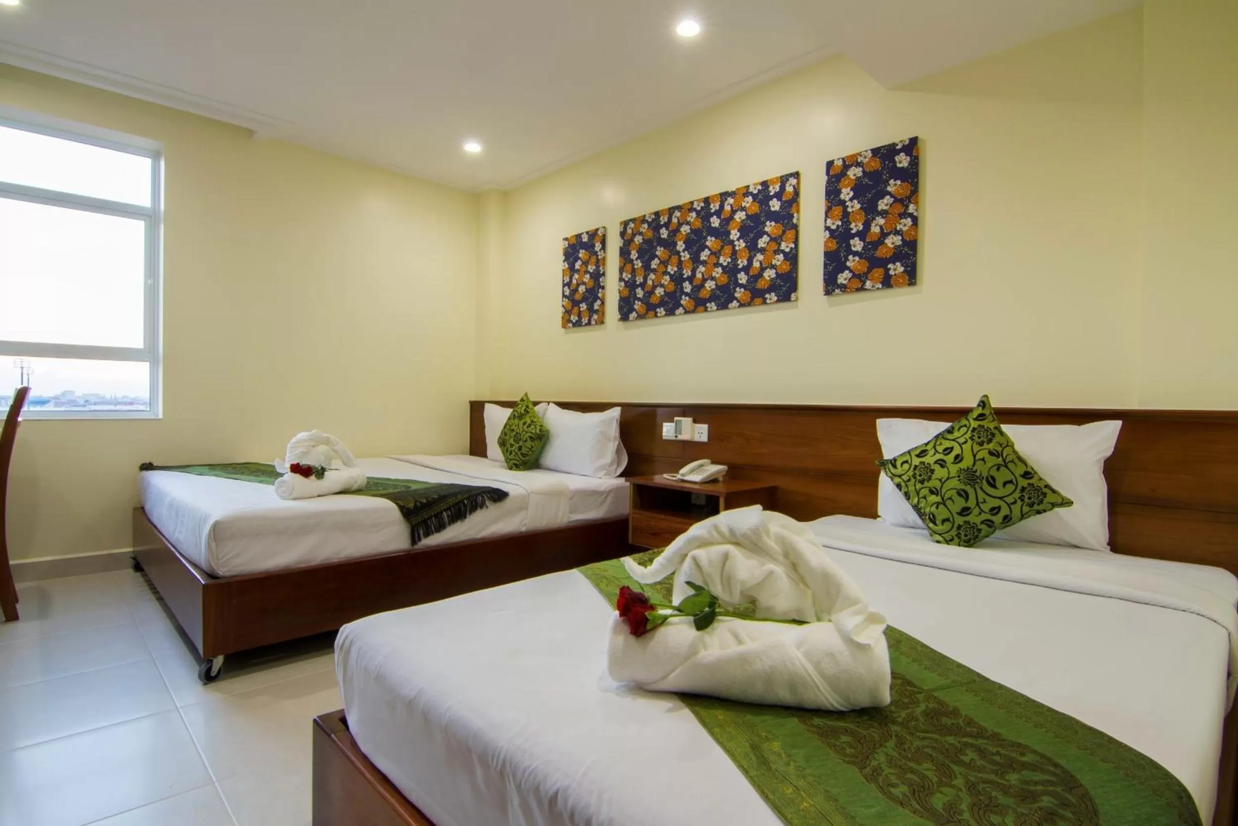 Bed in Rose Emerald Hotel