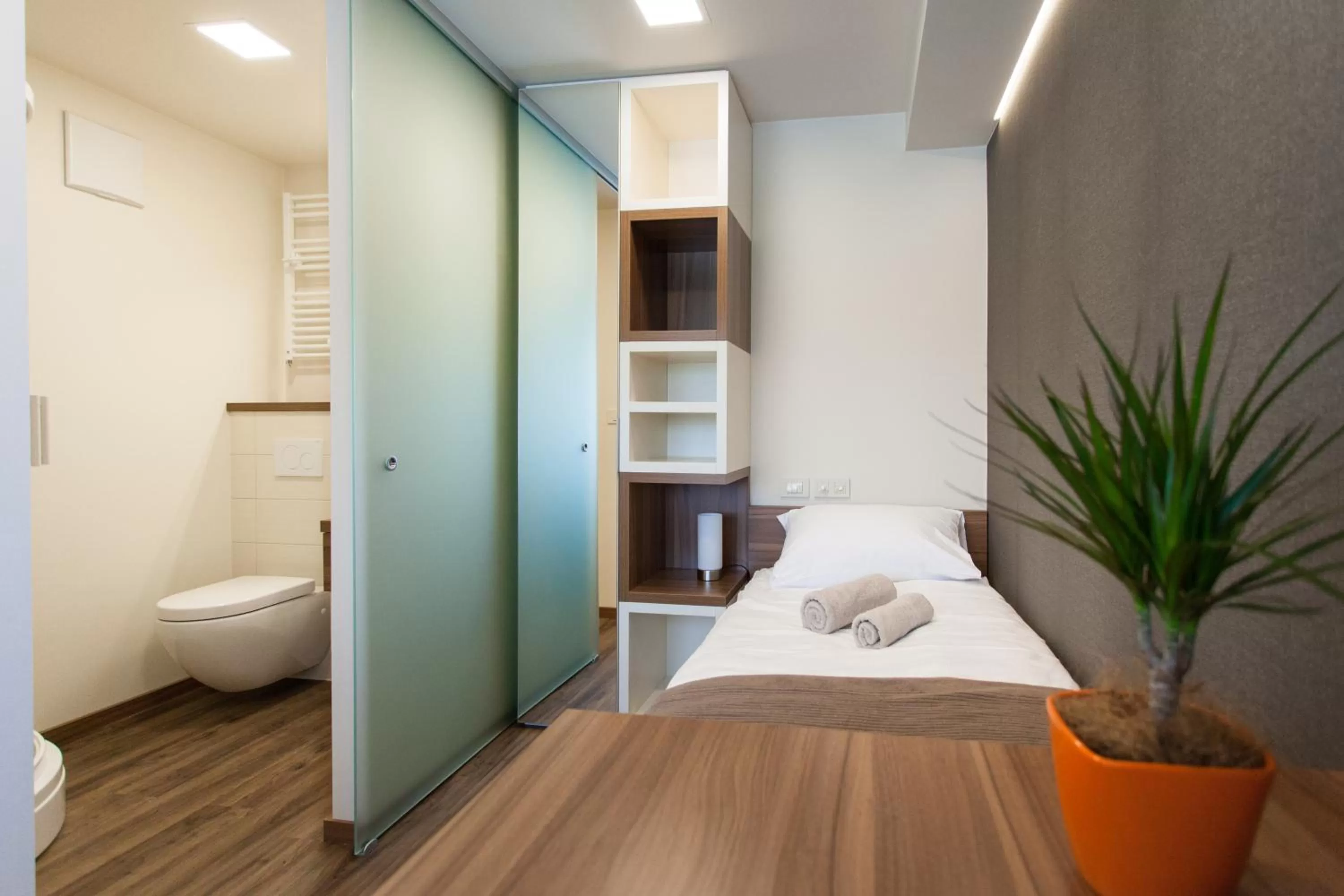 Bed in Hotel Pomaranča