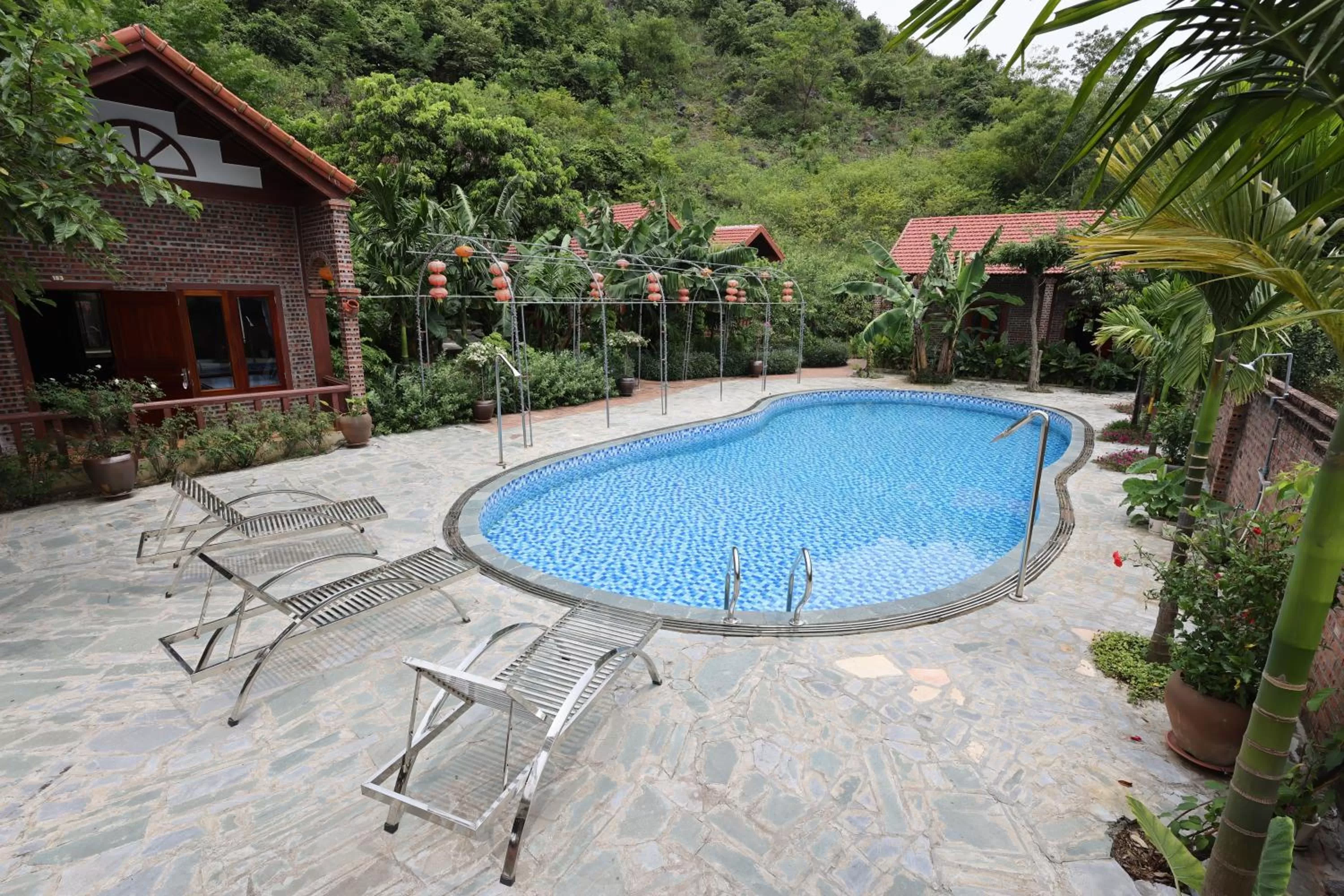 Pool view in Phạm Gia Homestay Ecogarden