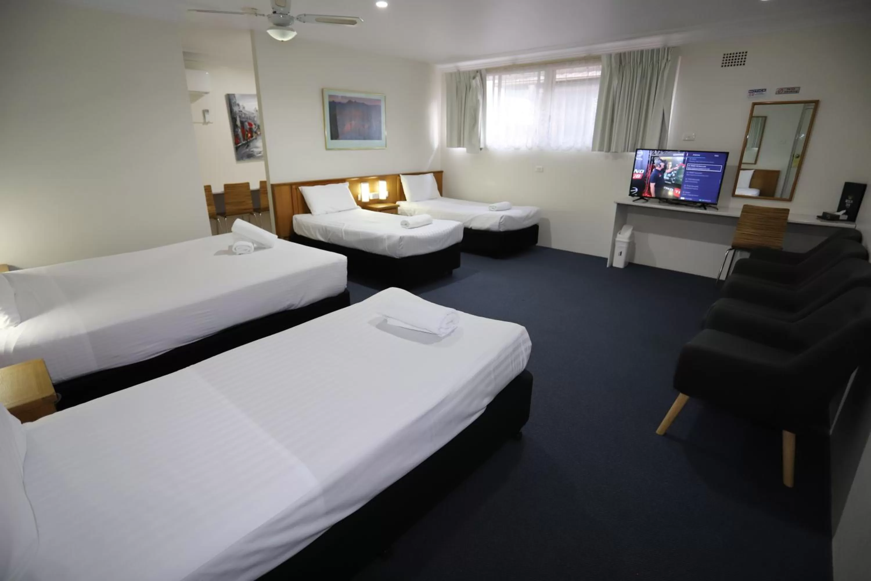 Photo of the whole room, Bed in Reign Inn Newcastle