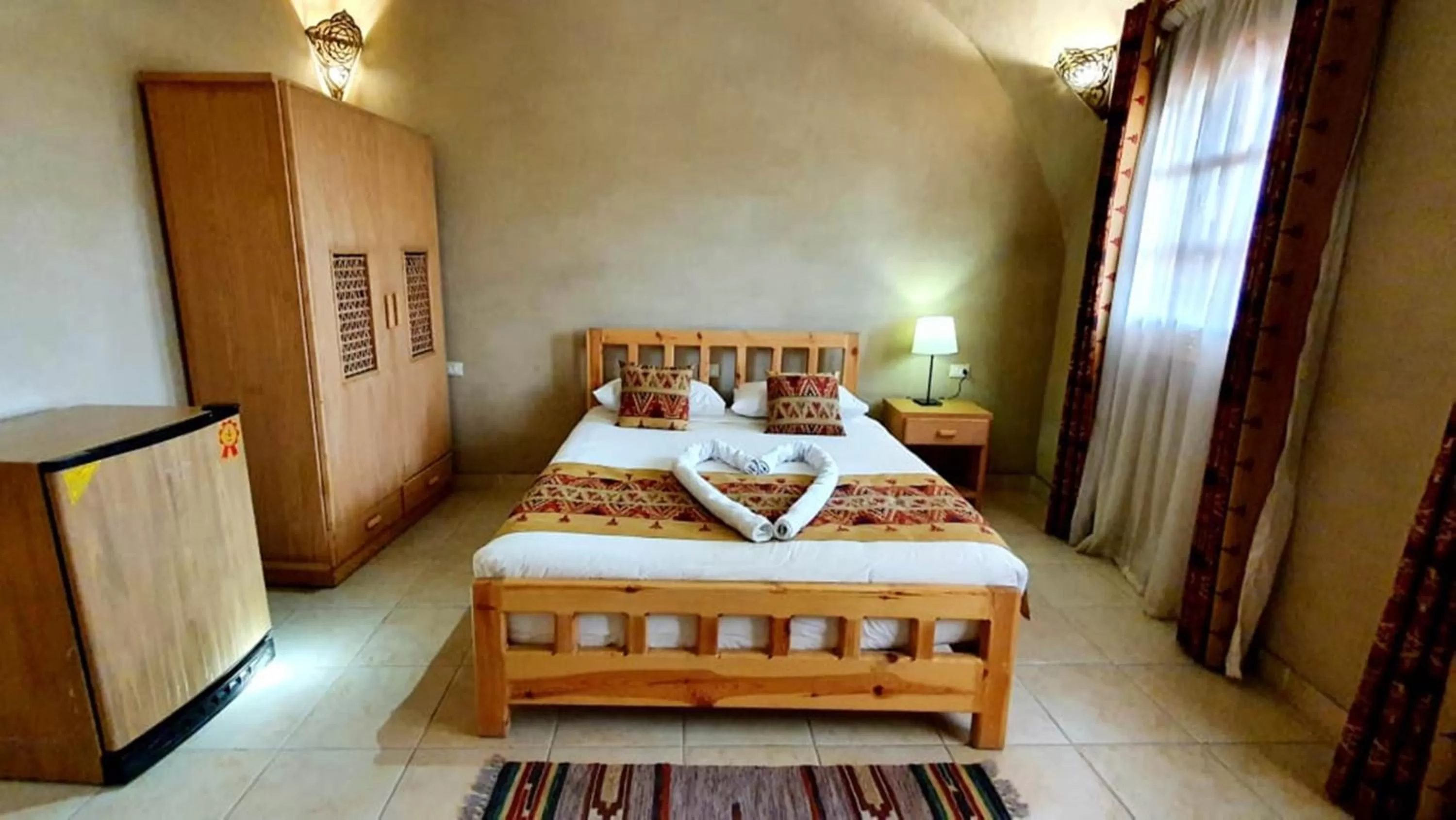 Bed in Embrace Hotel