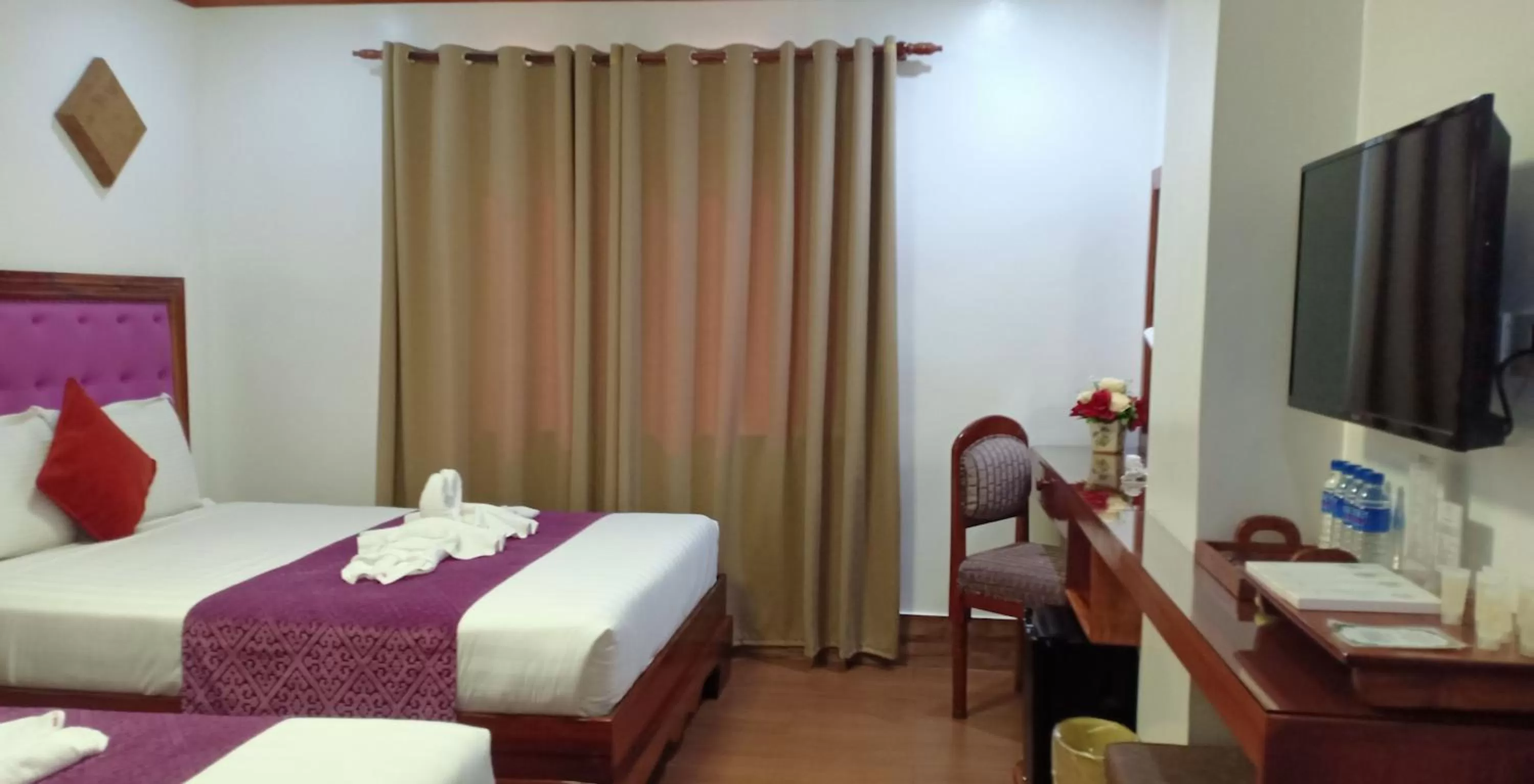 TV and multimedia, TV/Entertainment Center in CLN Boutique Hotel