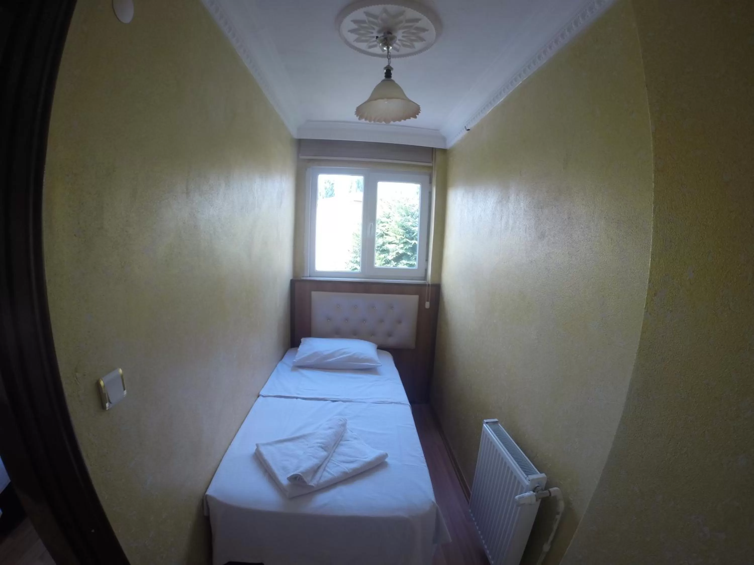 Bed, Room Photo in Arat Apartments