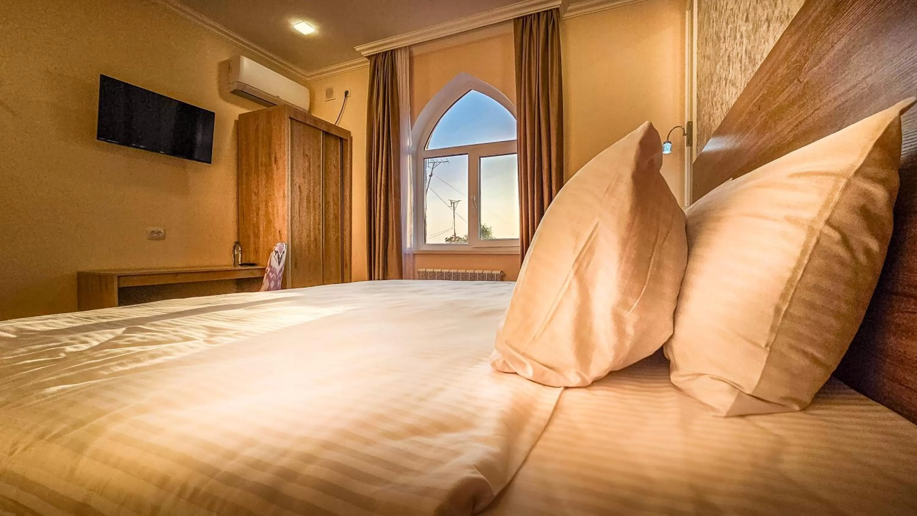 Bed in Hotel Bankir Khiva
