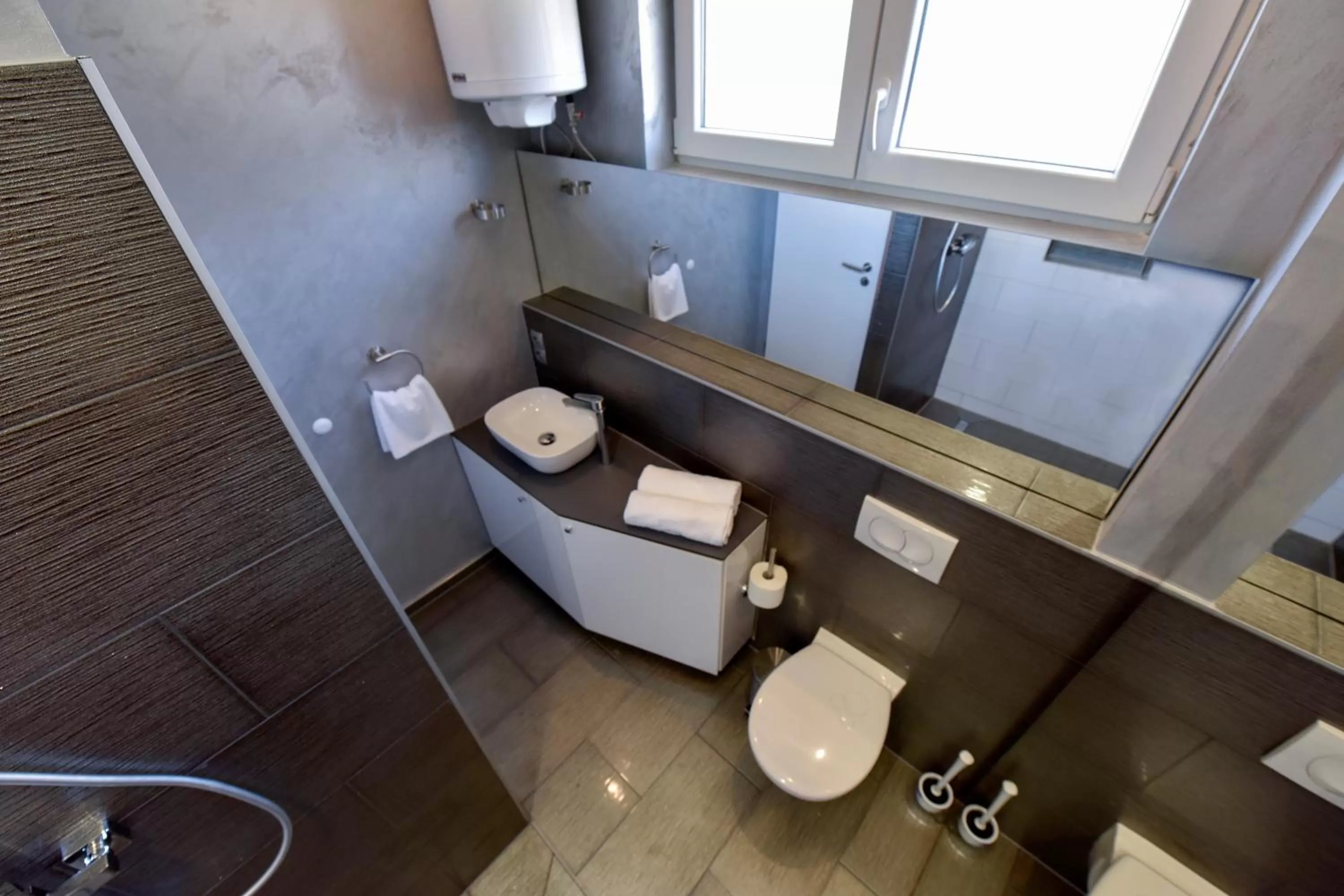 Bathroom in Apartmani i Bungalovi TROJKA