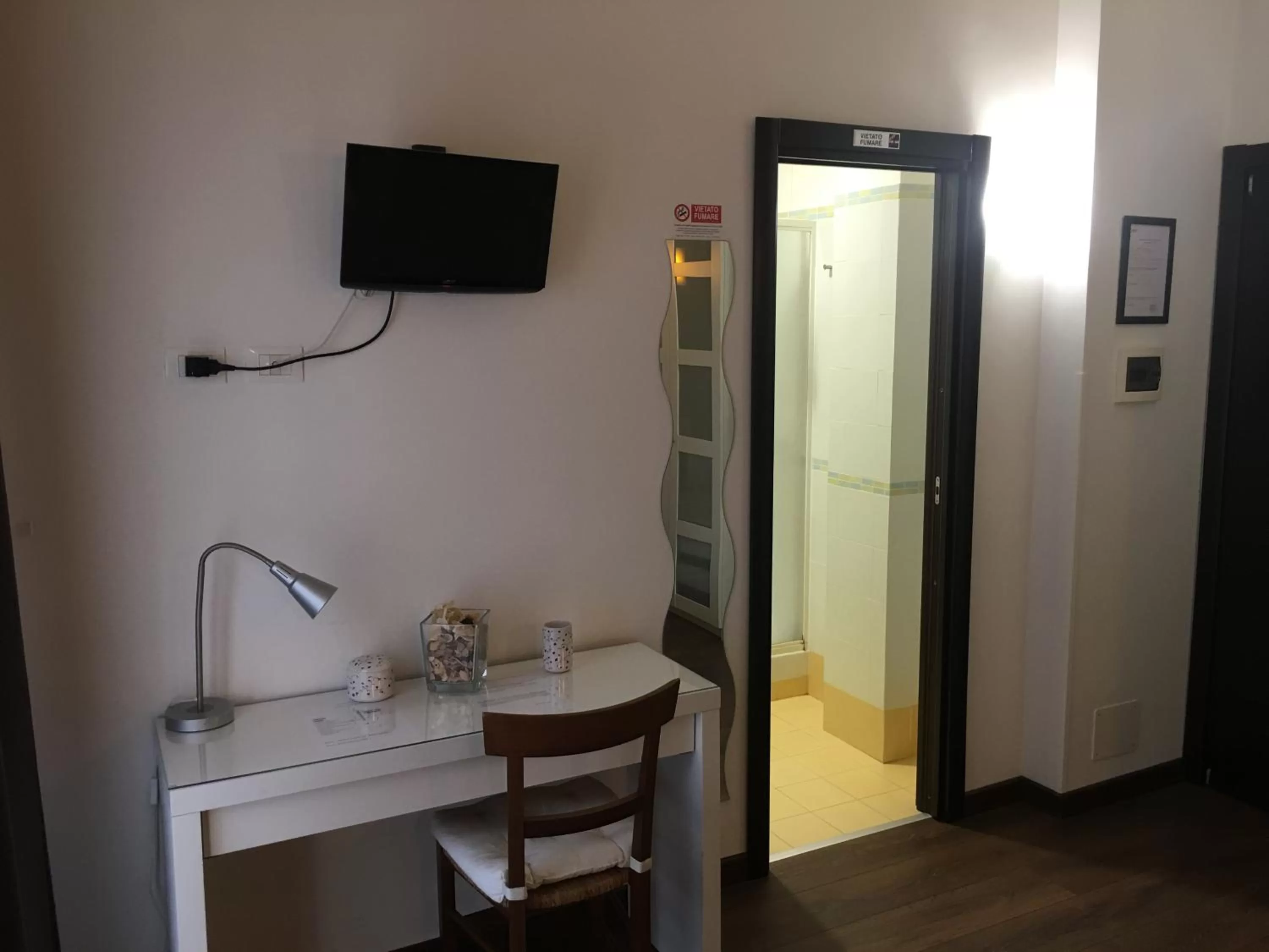 Bathroom, TV/Entertainment Center in Almi Rooms