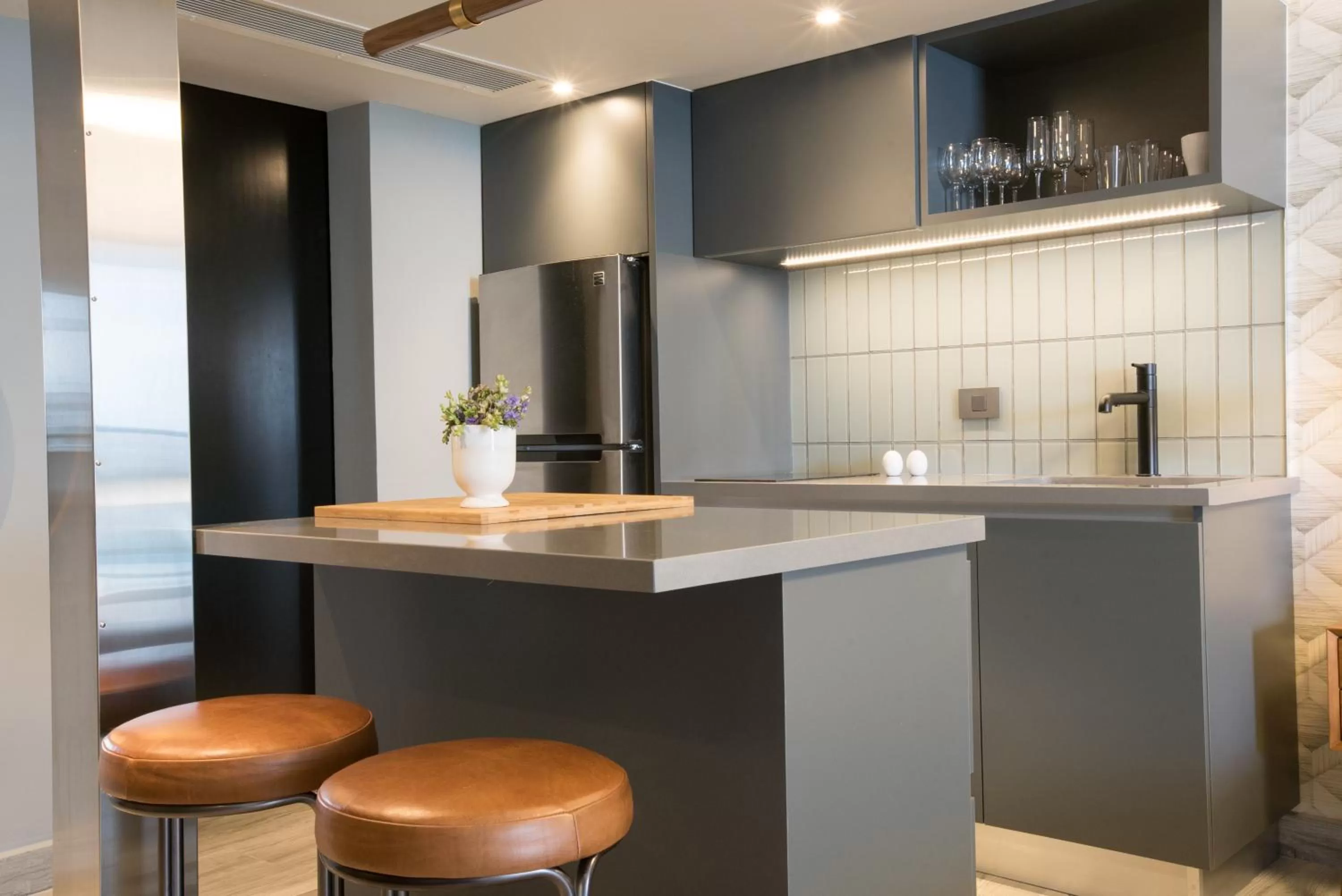 Kitchen or kitchenette, Bathroom in OCEAN VIEW DELUXE SUITE: PVT. BEACH & POOL