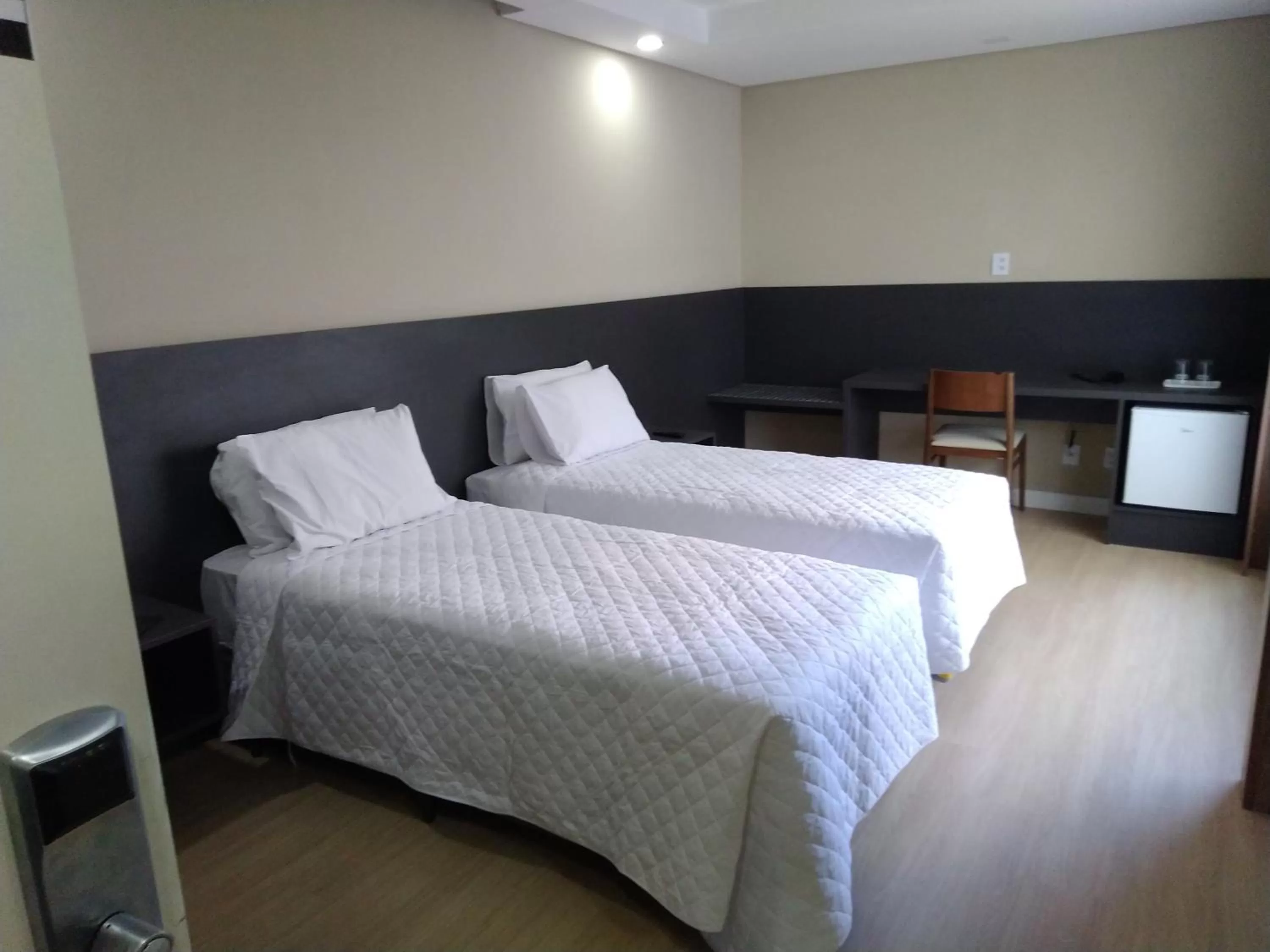 Bed in M Tower Hotel