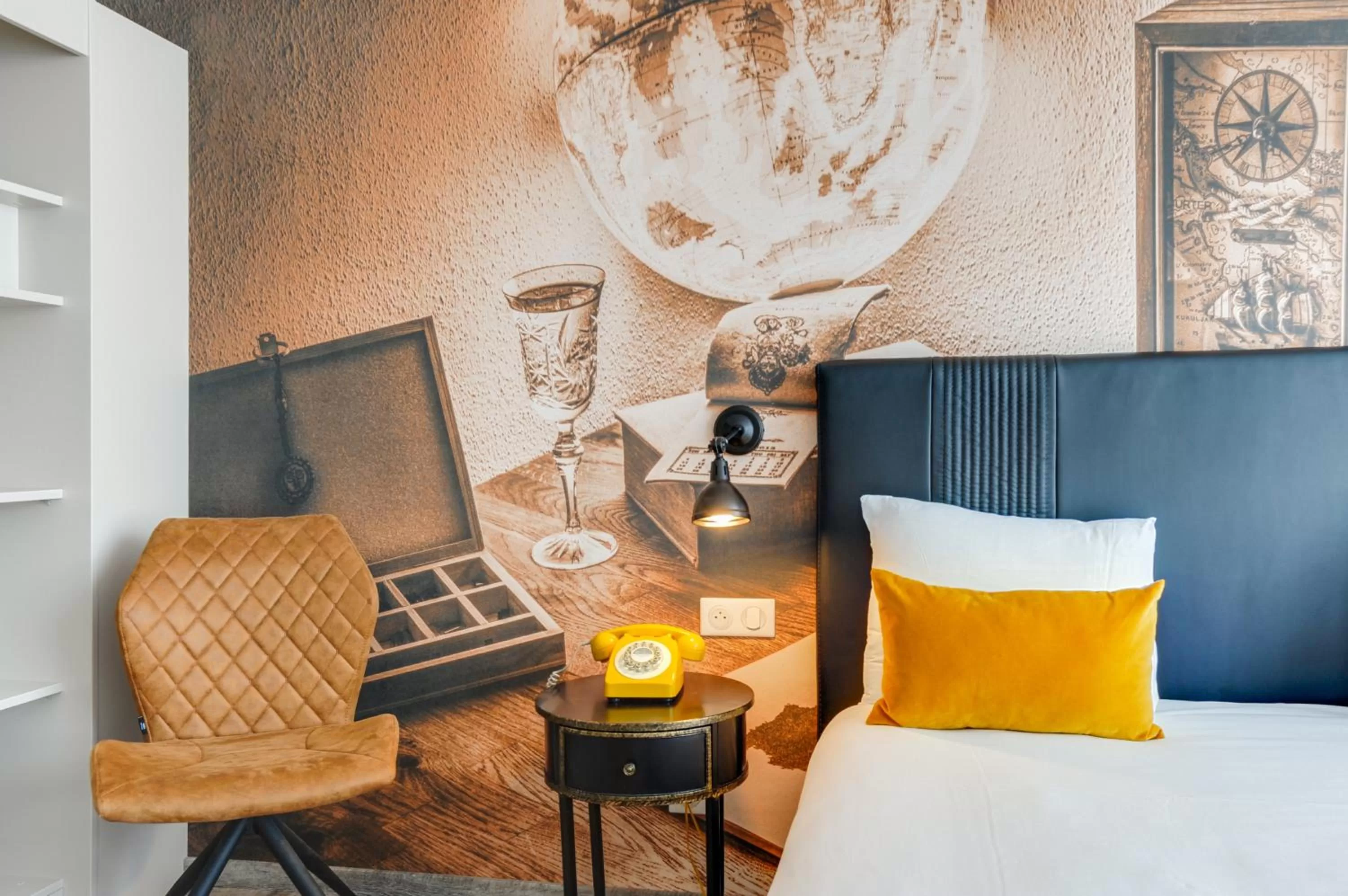 Bed in La Maison Hôtel Mulhouse Centre