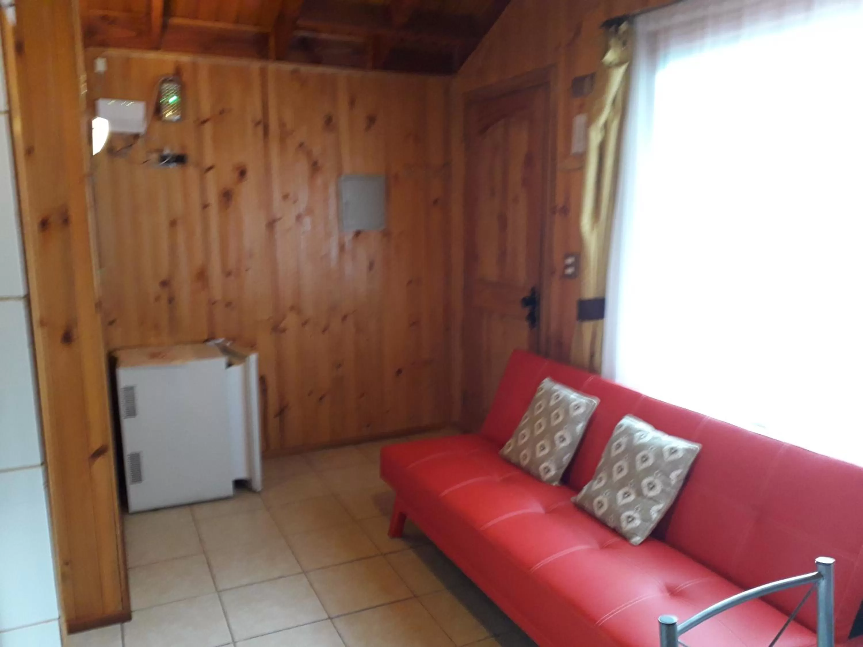 Living room, Seating Area in Apart-Hotel Colonia-Königsberg ESTACIONAMIENTO Deptos Completos Ubicado En El Centro De Valdivia AIRE ACONDICIONADO