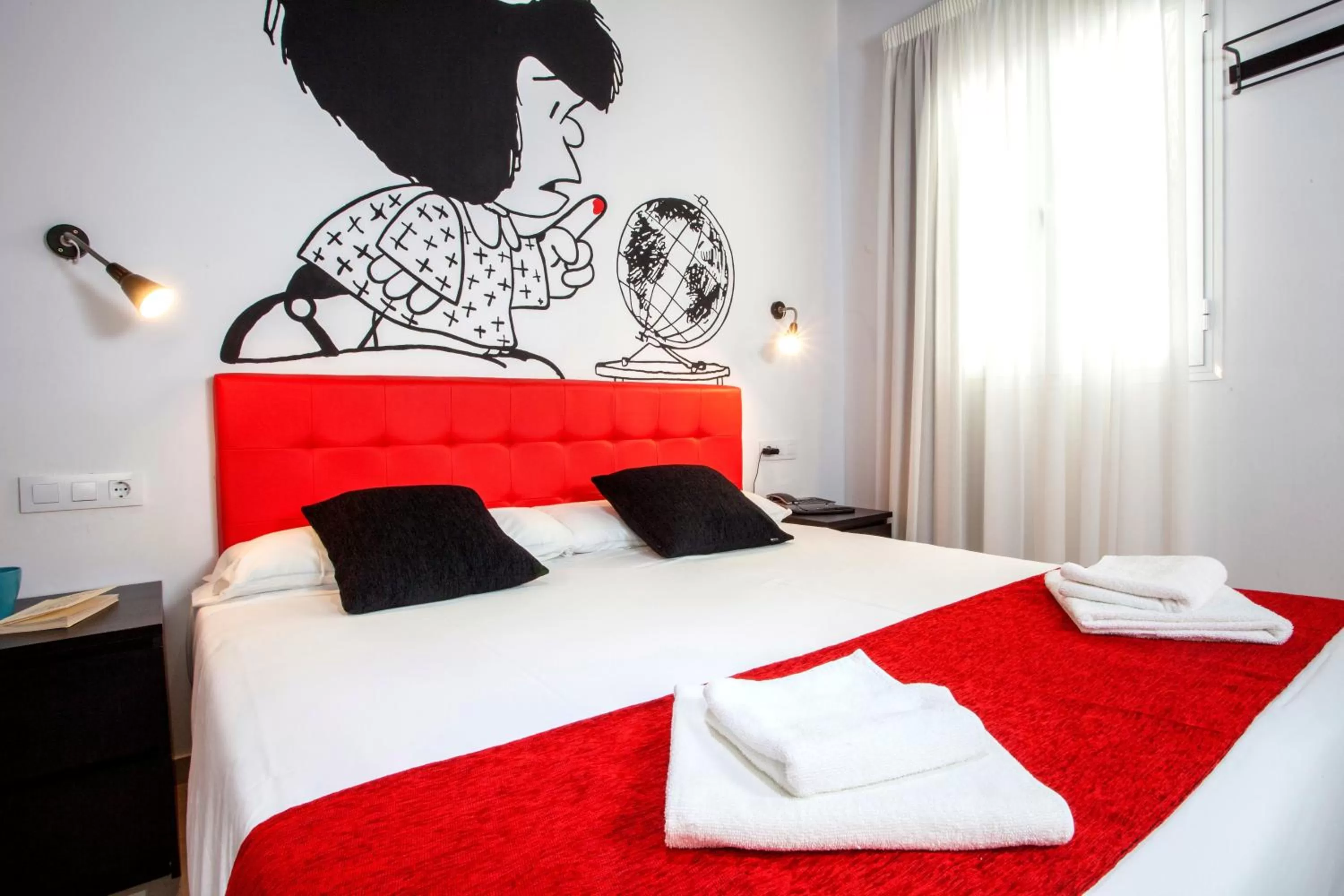 Photo of the whole room, Bed in Casual de las Letras Sevilla