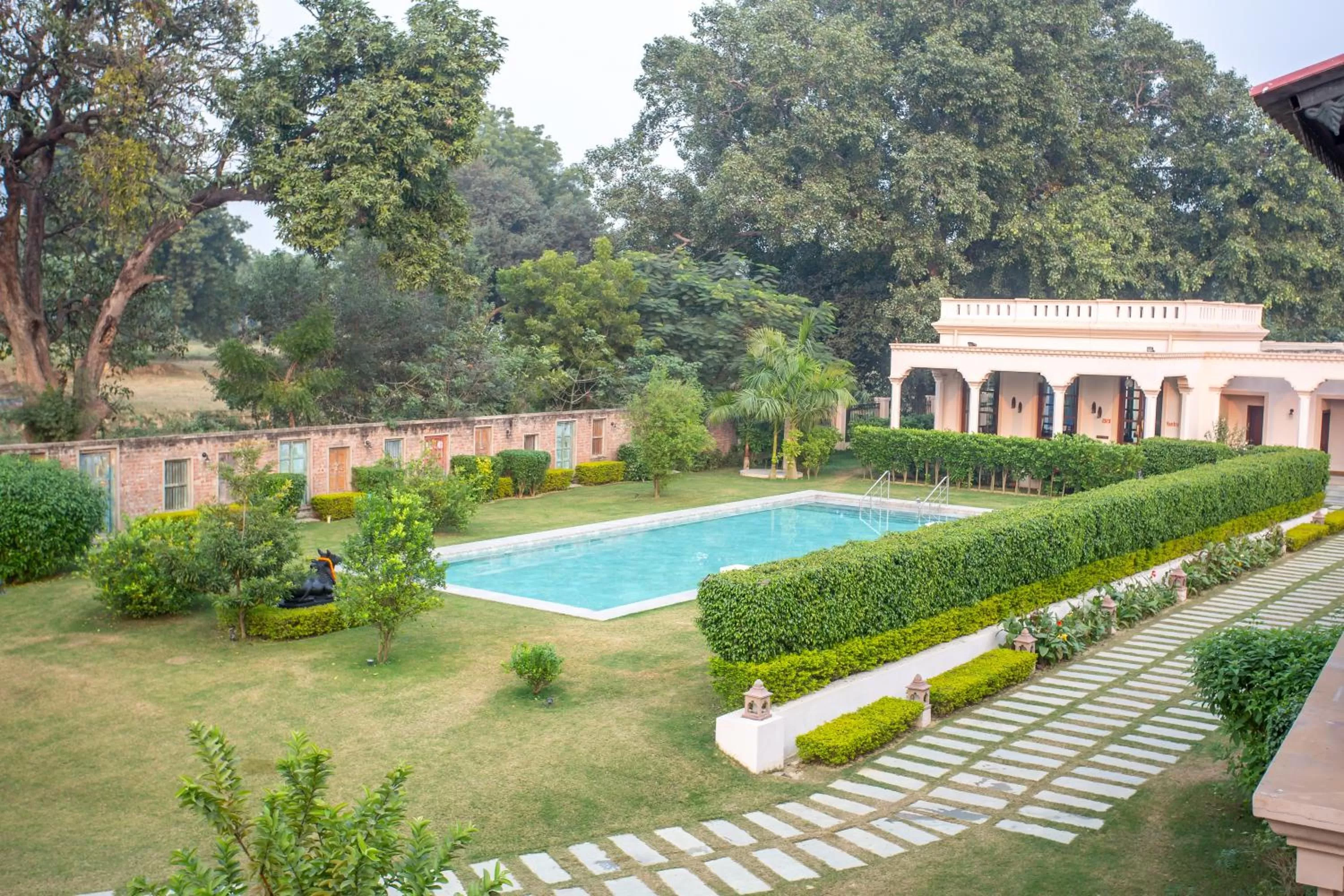 Swimming pool in Tree of Life Resort & Spa Varanasi