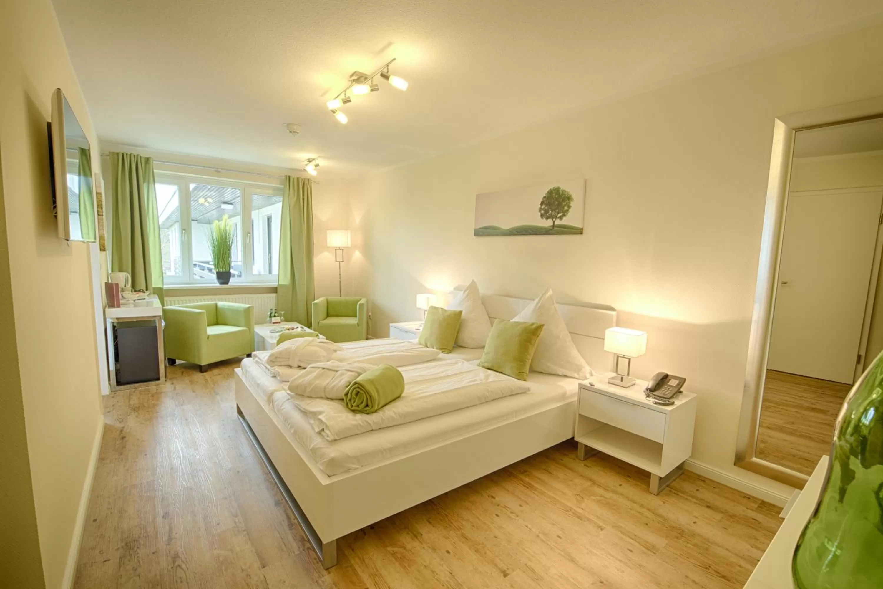 Photo of the whole room, Bed in Das Frühstückshotel Sankt Peter-Ording