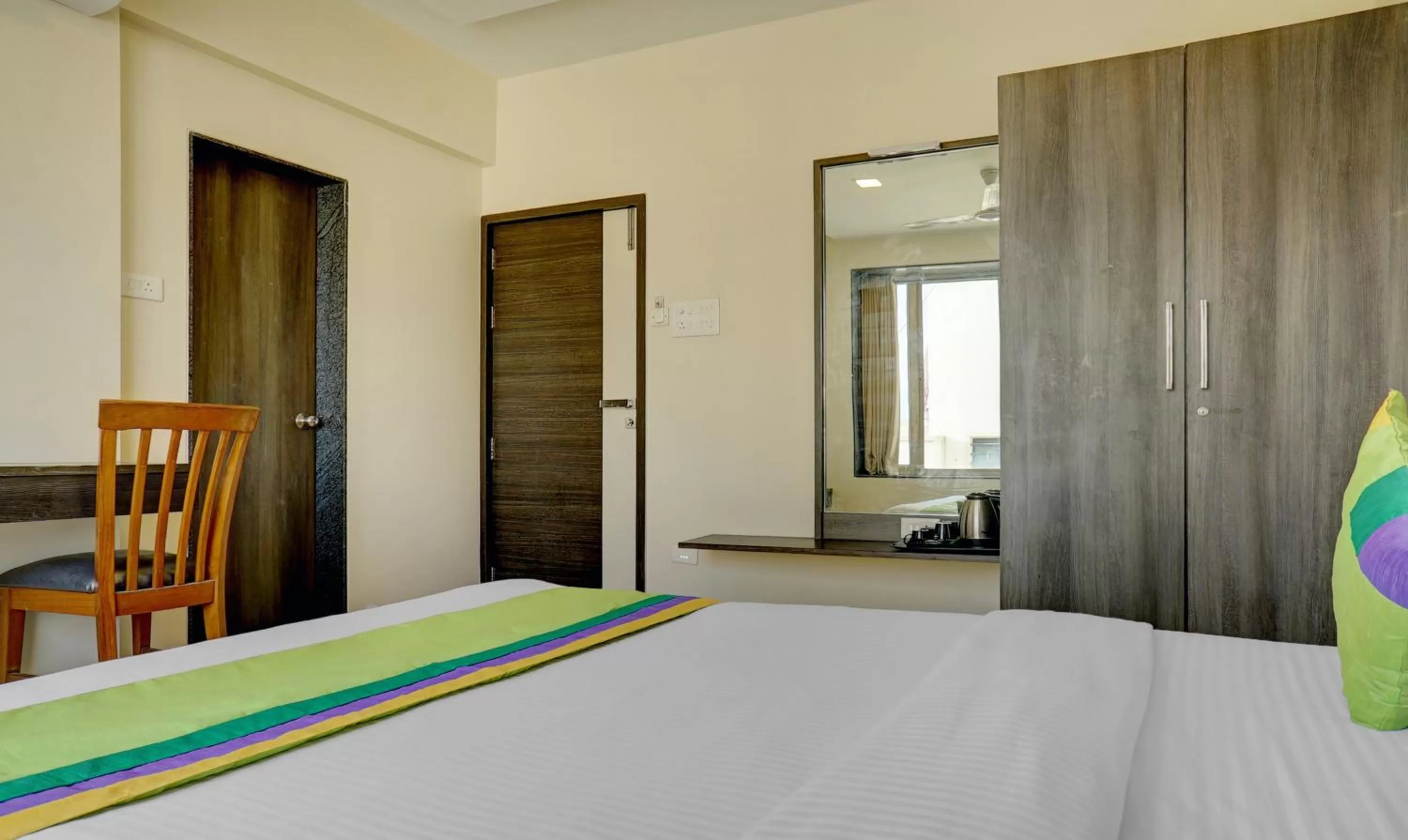 Bedroom, Bed in Treebo Bhagyashree Executive