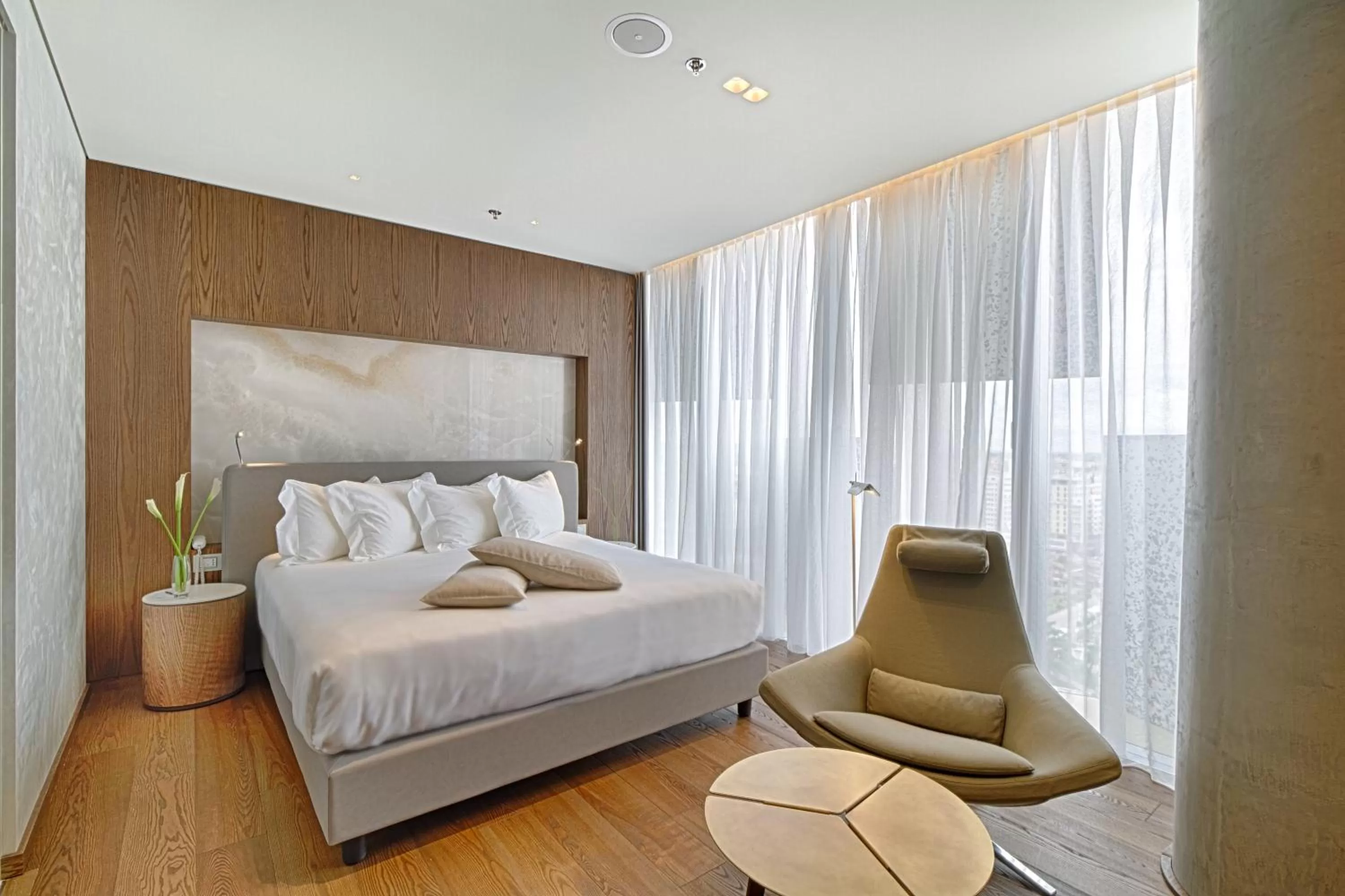 Seating area, Bed in Maritim Hotel Plaza Tirana