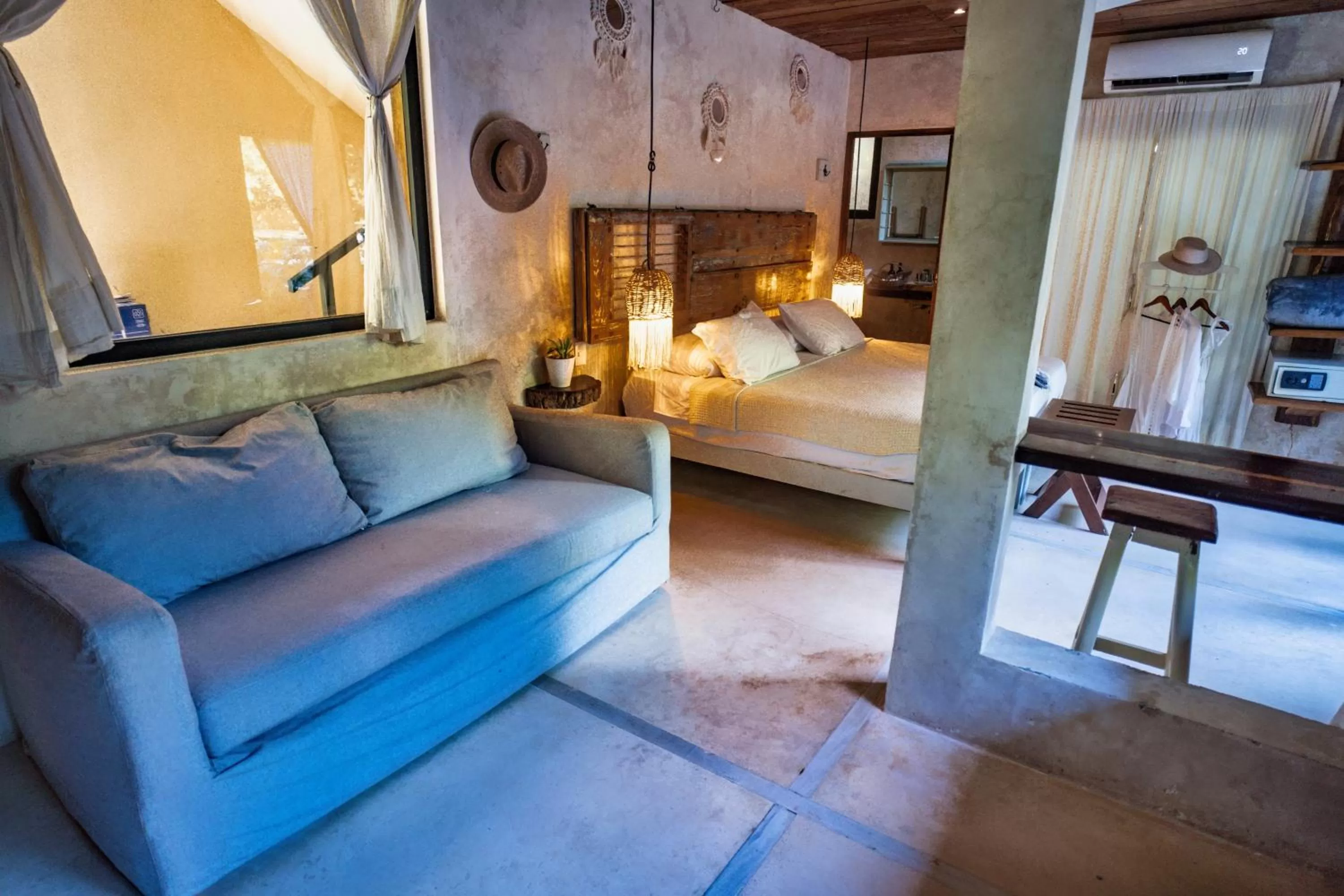 Living room, Bed in Suites Tulum