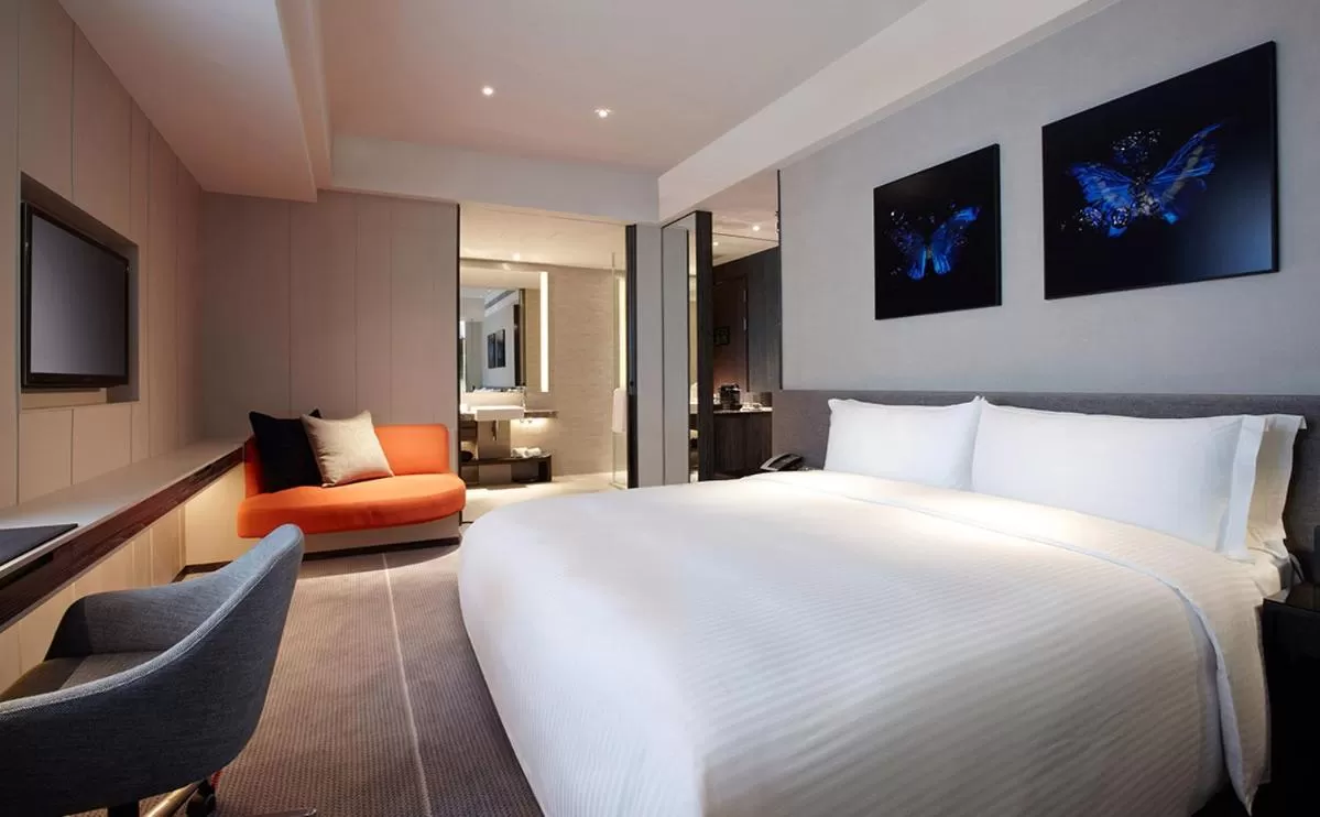 Bed in Humble House Taipei, Curio Collection by Hilton