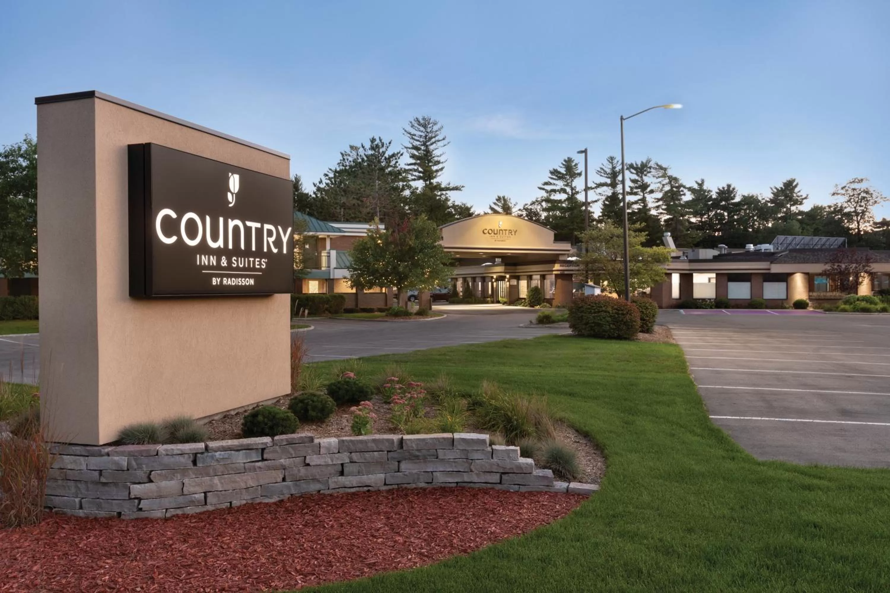 Property logo or sign in Country Inn & Suites by Radisson, Traverse City, MI