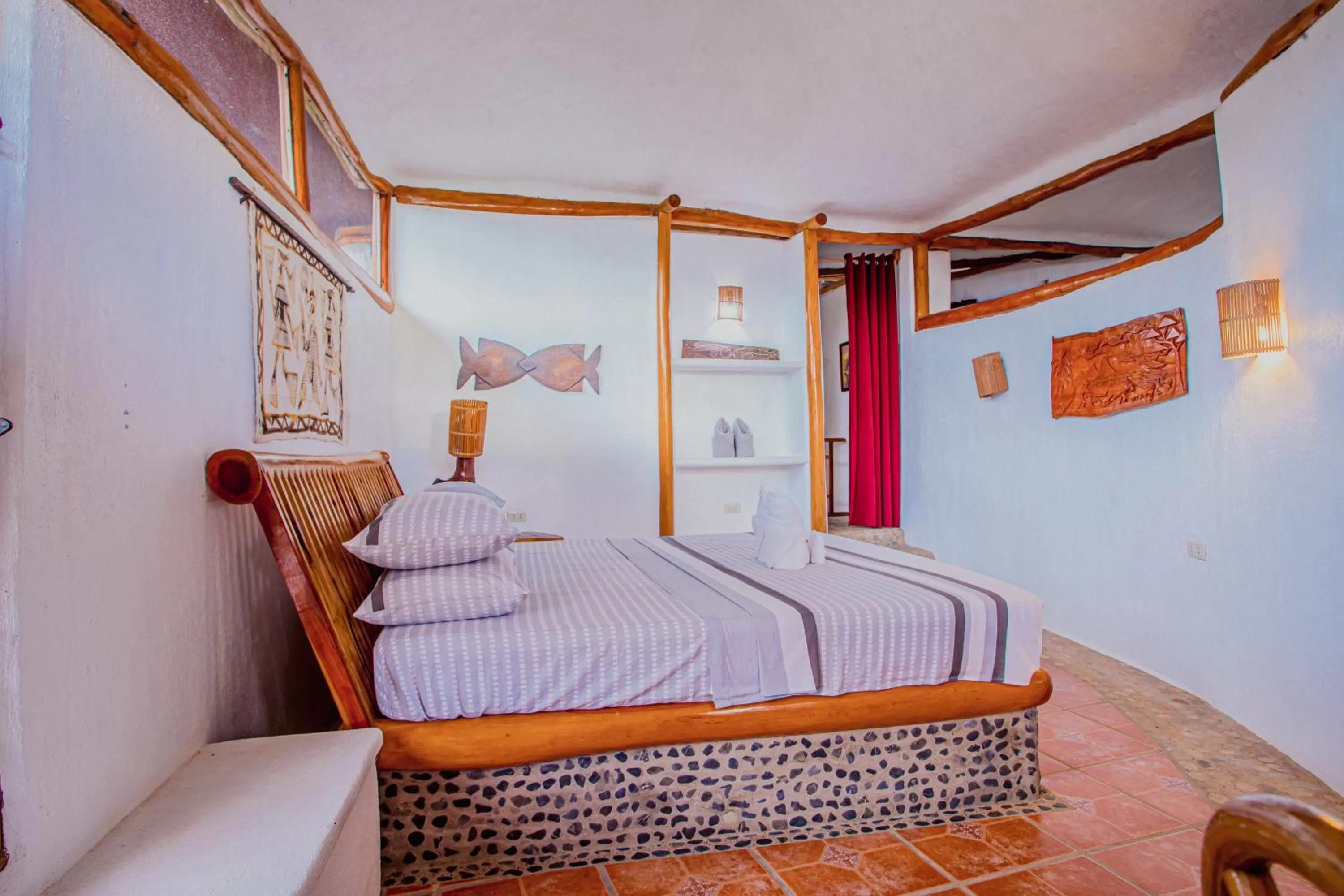 Bed in Atremaru Jungle Retreat