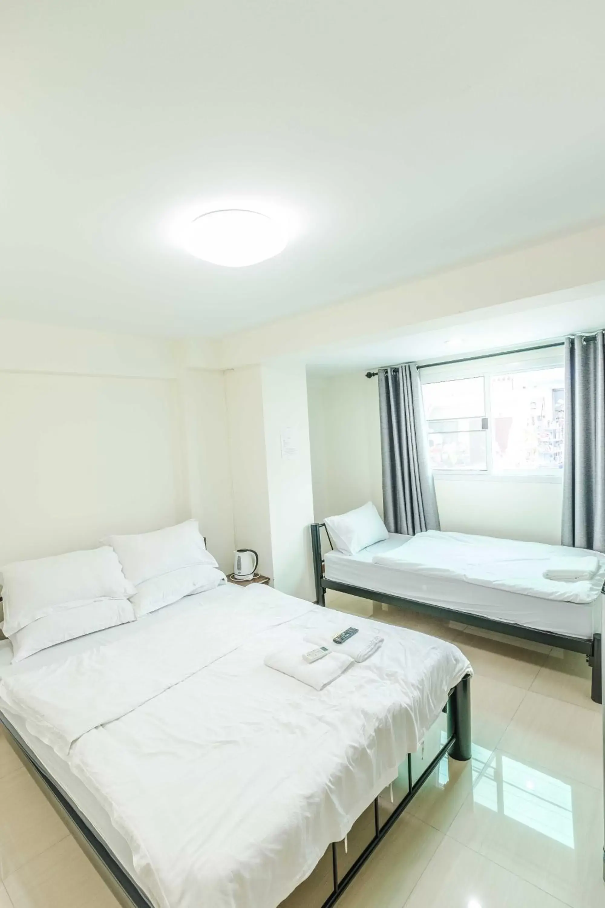 Family Room (3 Adults) in Don Muang Hotel Family Room (3 Adults) in Don Muang Hotel