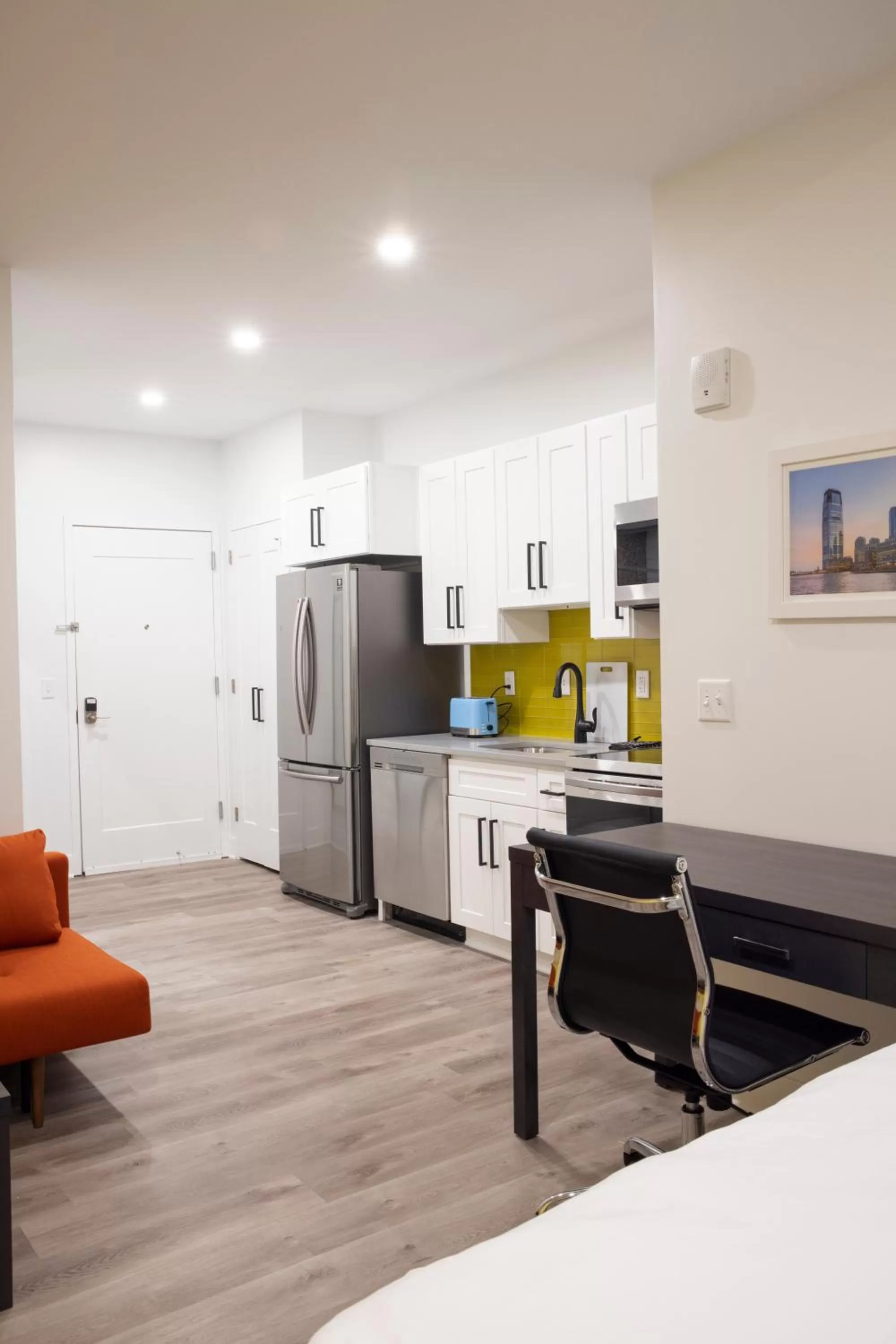 Kitchen or kitchenette in Peachtree Suites - Jersey City