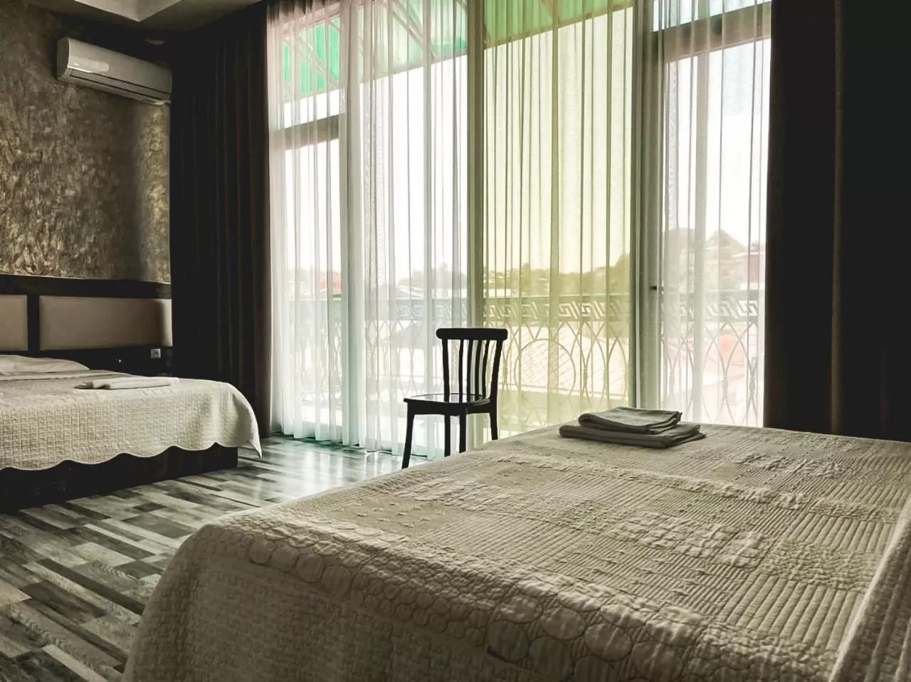 Bed in Discovery Hotel