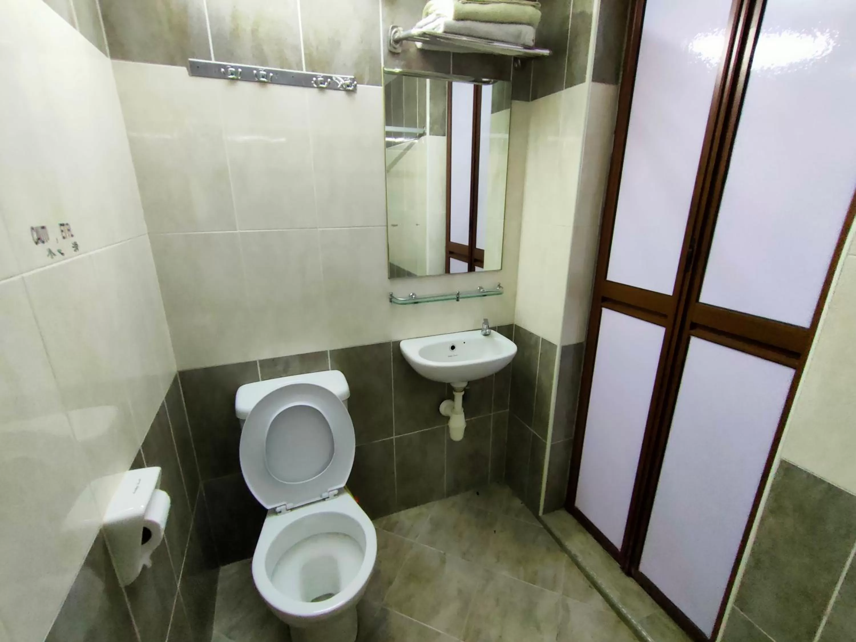 Toilet in Cozzy Motel Malacca