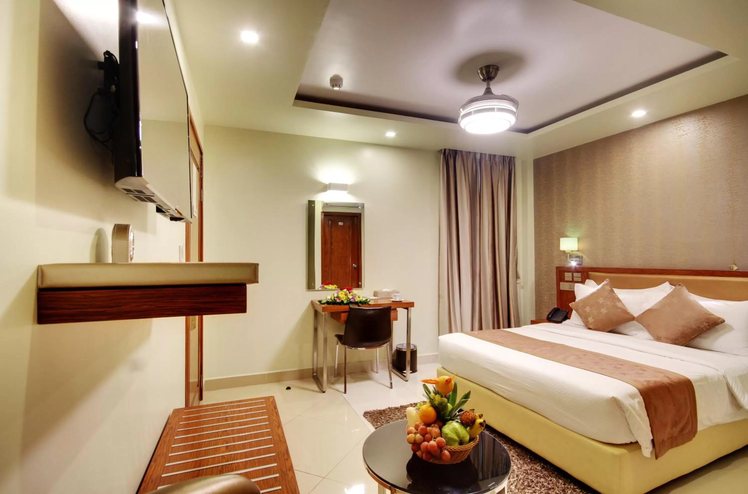 Photo of the whole room, Bed in Unima Grand